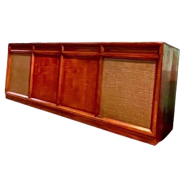 “If art decorates space… and music is the art that decorates time, then our vintage stereo consoles decorate lives by accentuating both.”

This console:
This is a console refurbished by us.  We acquire our pieces from very reliable, established, and