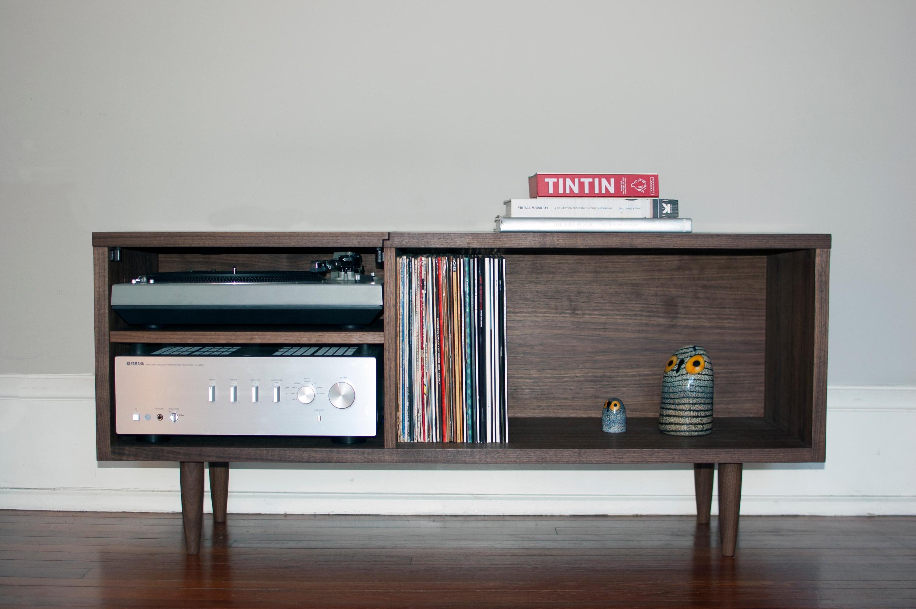 Our low lux credenza is designed to accept the timeless Yamaha A-S501 integrated amplifier and minimalist Pro-Ject T1 turntable. This compact cabinet is hand crafted of premium veneer core American walnut and finished with a satin tung oil.