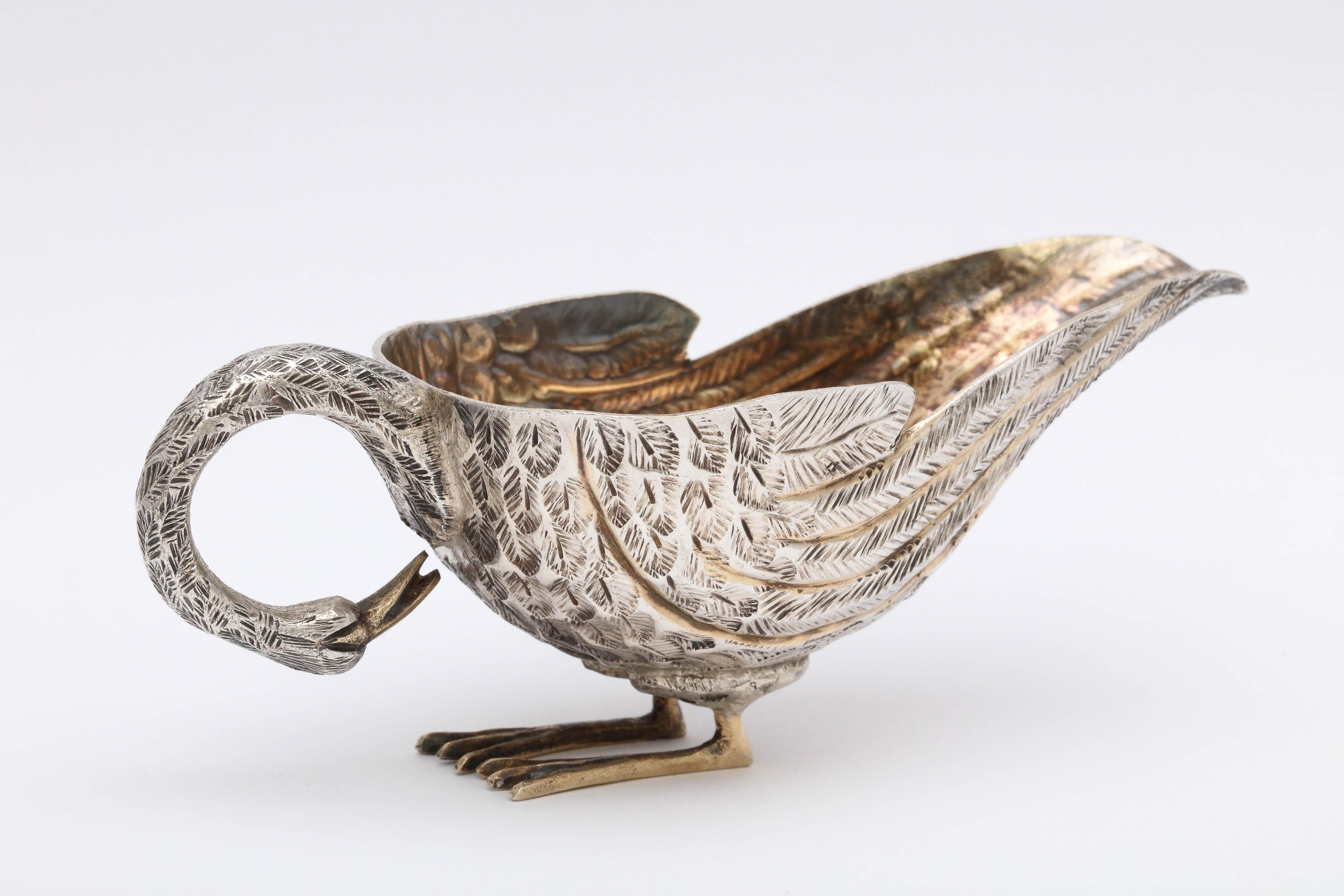 Mid-Century Modern, sterling silver lightly gilded, swan-form gravy or sauce boat, Mexico, circa 1950s, Tane - maker. Inside of sauce boat is lightly gilded, as are the outer edges of the swan'as feathers. The swan's head and neck are gracefully
