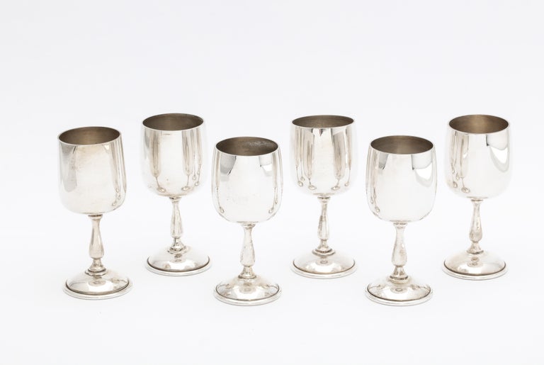 Mid-Century Modern, sterling silver set of six (6) cordial glasses, Baldwin and Miller Co., Indianapolis, Indiana, circa 1950s. Each glass measures a little under 3 inches high x 1 1/4 inches diameter at widest point. Total weight of the set is