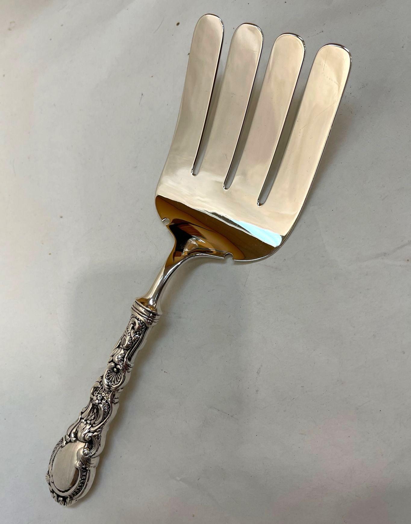 Mid-Century Modern Sterling Silver Vintage Asparagus Serving Fork Simply Awesome! Entirely in Sterling Silver Large Asparagus Serving Fork. Handle Beautifully crafted with Shell and Artisan designs. Large 3” x 4” serving surface. Fork measures 9.5”