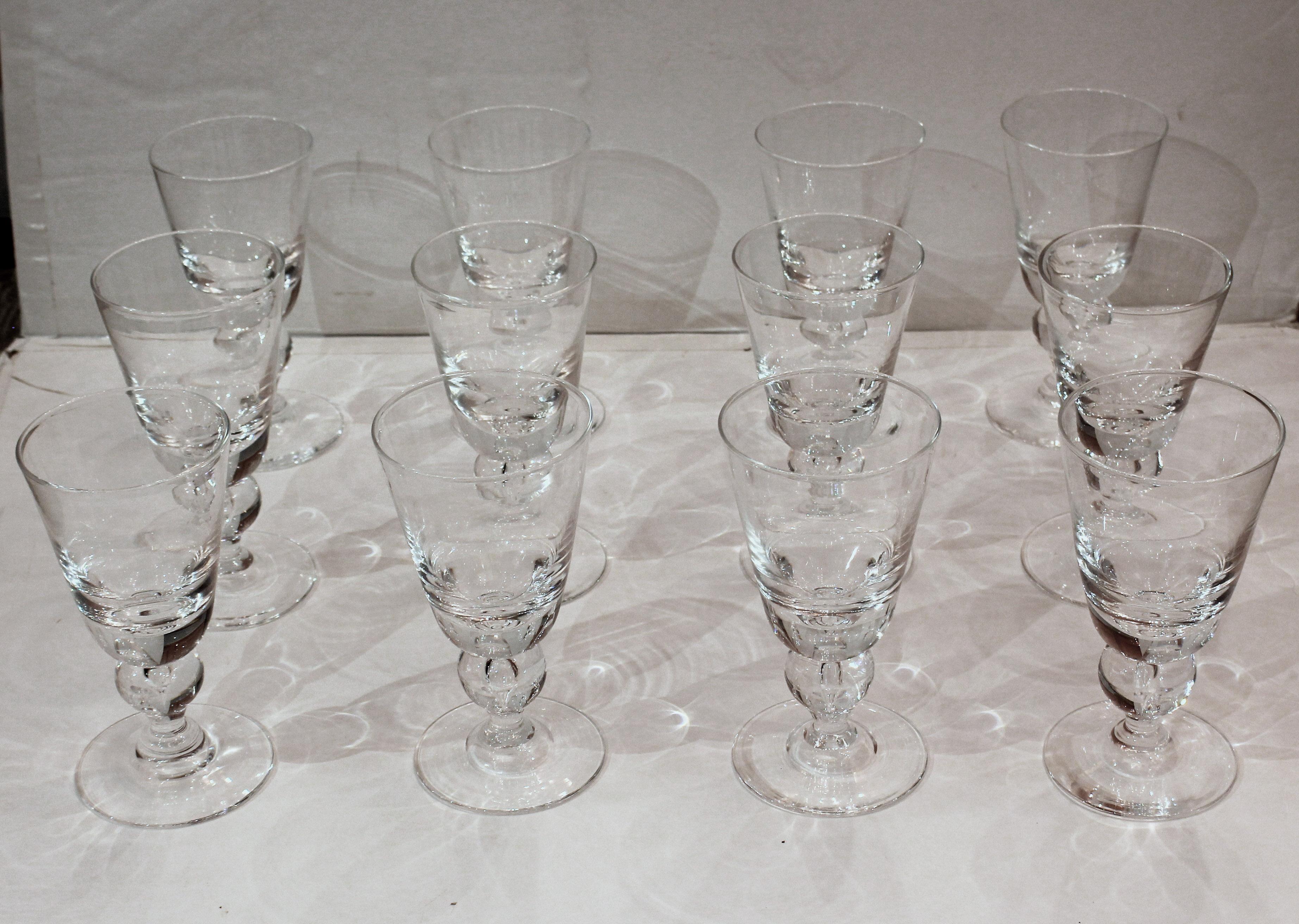 Mid century modern set of 12 Steuben tear drop water goblets. Baluster shape. Each etched center base 