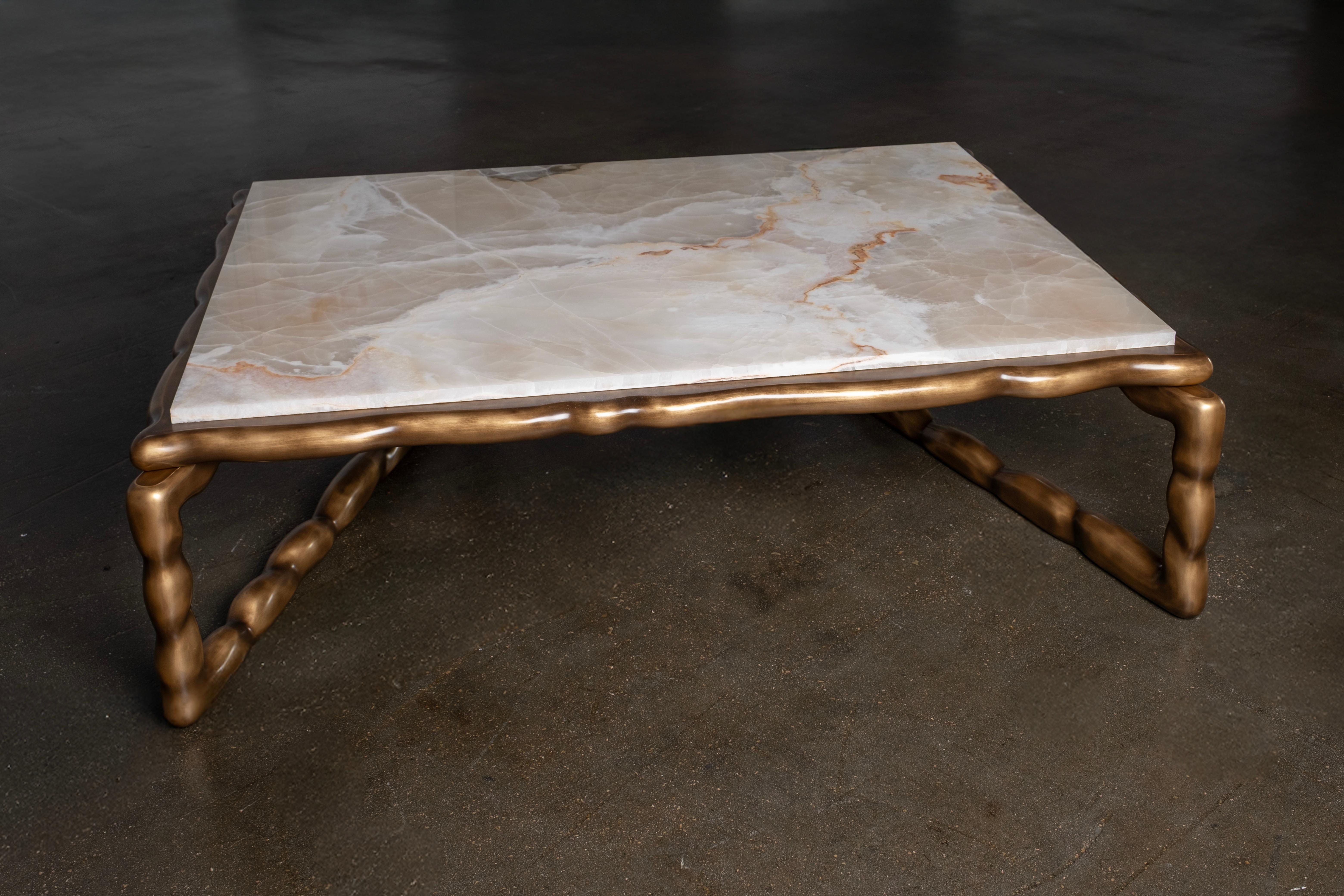 Mid-Century Modern Stone Coffee Table, Modern Collection, Handcrafted in Portugal - Europe by Greenapple.

Stone coffee table lives up to its name featuring an exuberant stone texture with beautiful, intricate veins.

The contrast between tabletop