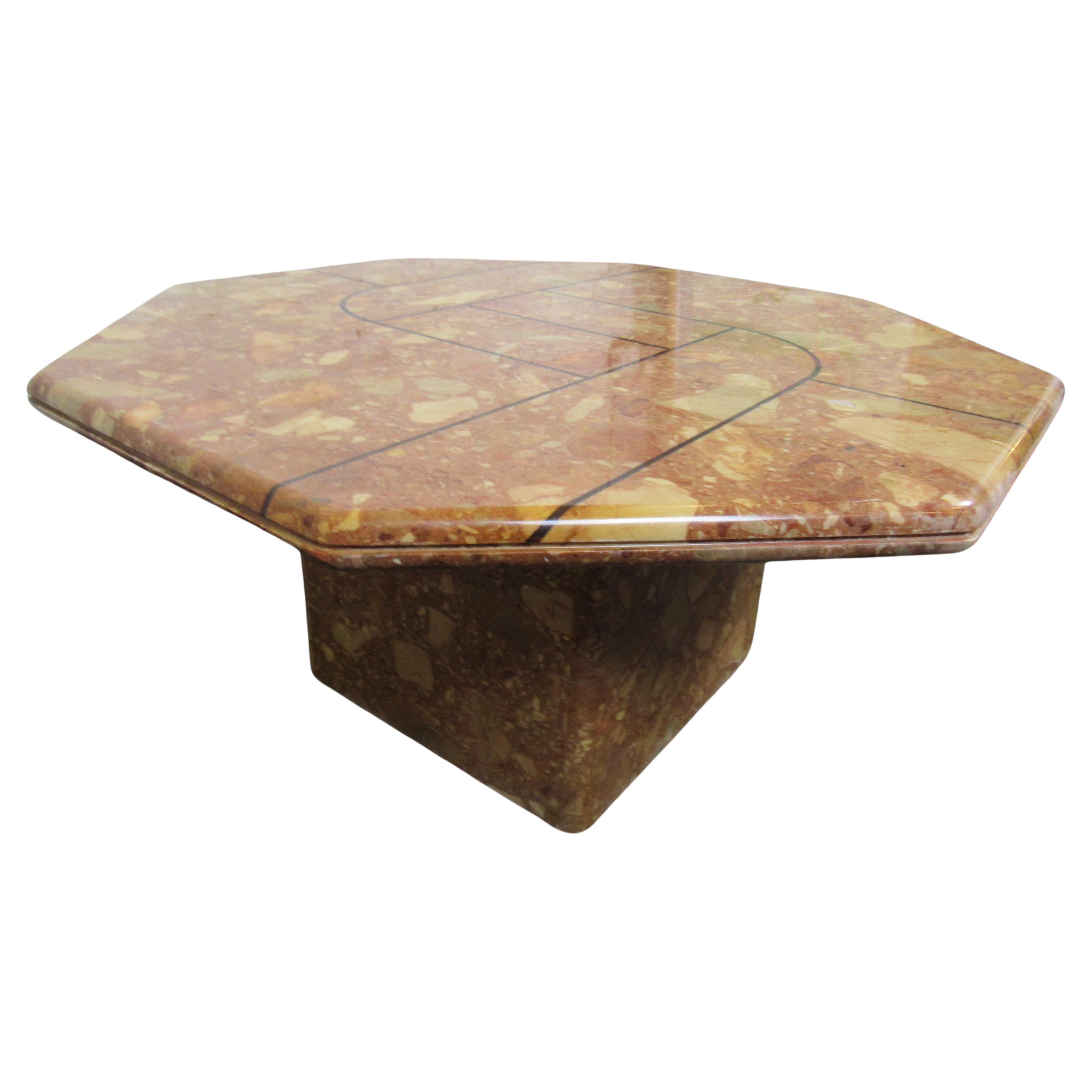 Unique salmon colored, solid stone side table or coffee table. Top piece can be removed from the base easily. 
(Please confirm item location - NY or NJ - with dealer).
 