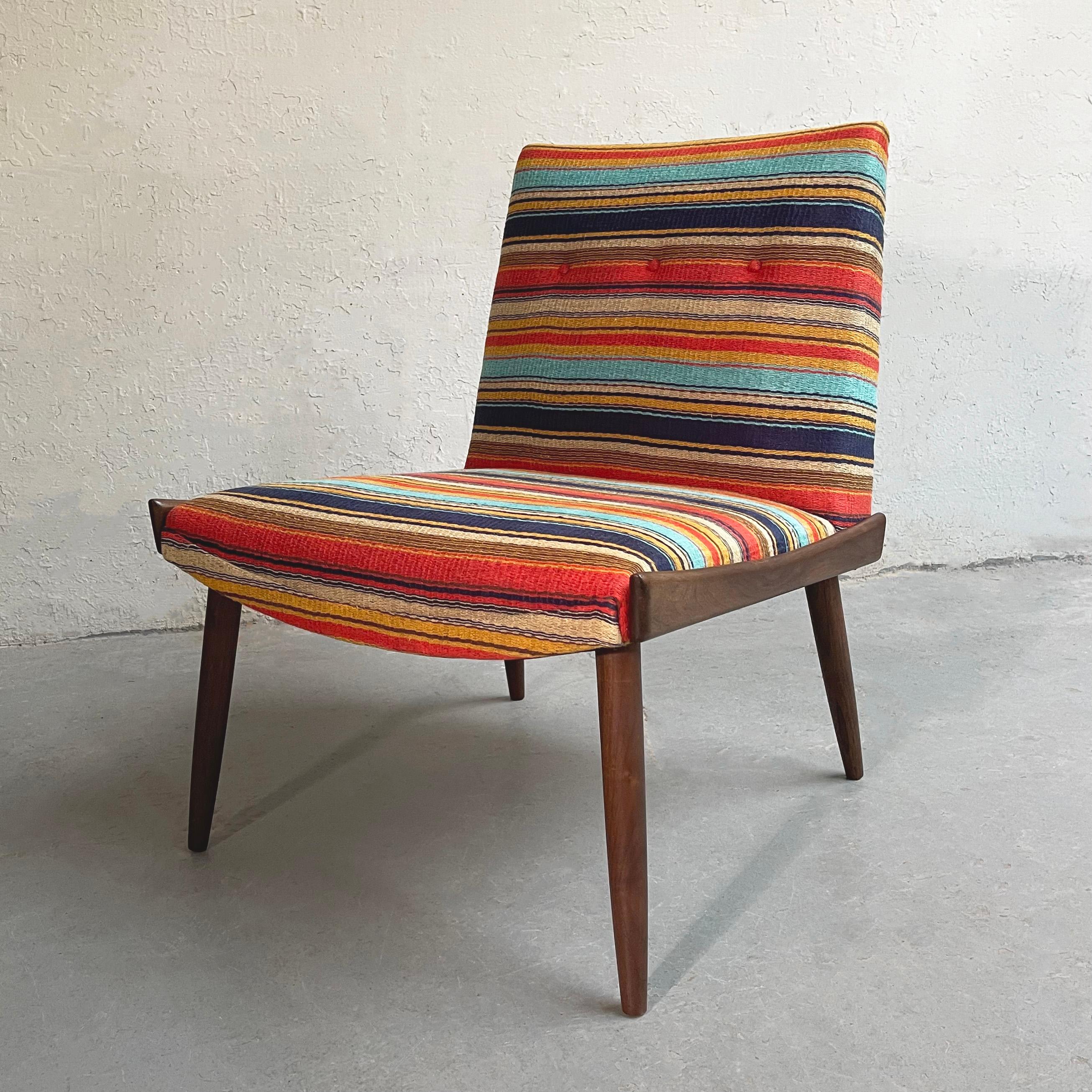 Minimal, Mid-Century Modern, slipper chair by Kroehler features a streamlined and sculptural, walnut frame with colorful striped upholstery. A wonderful accent chair.