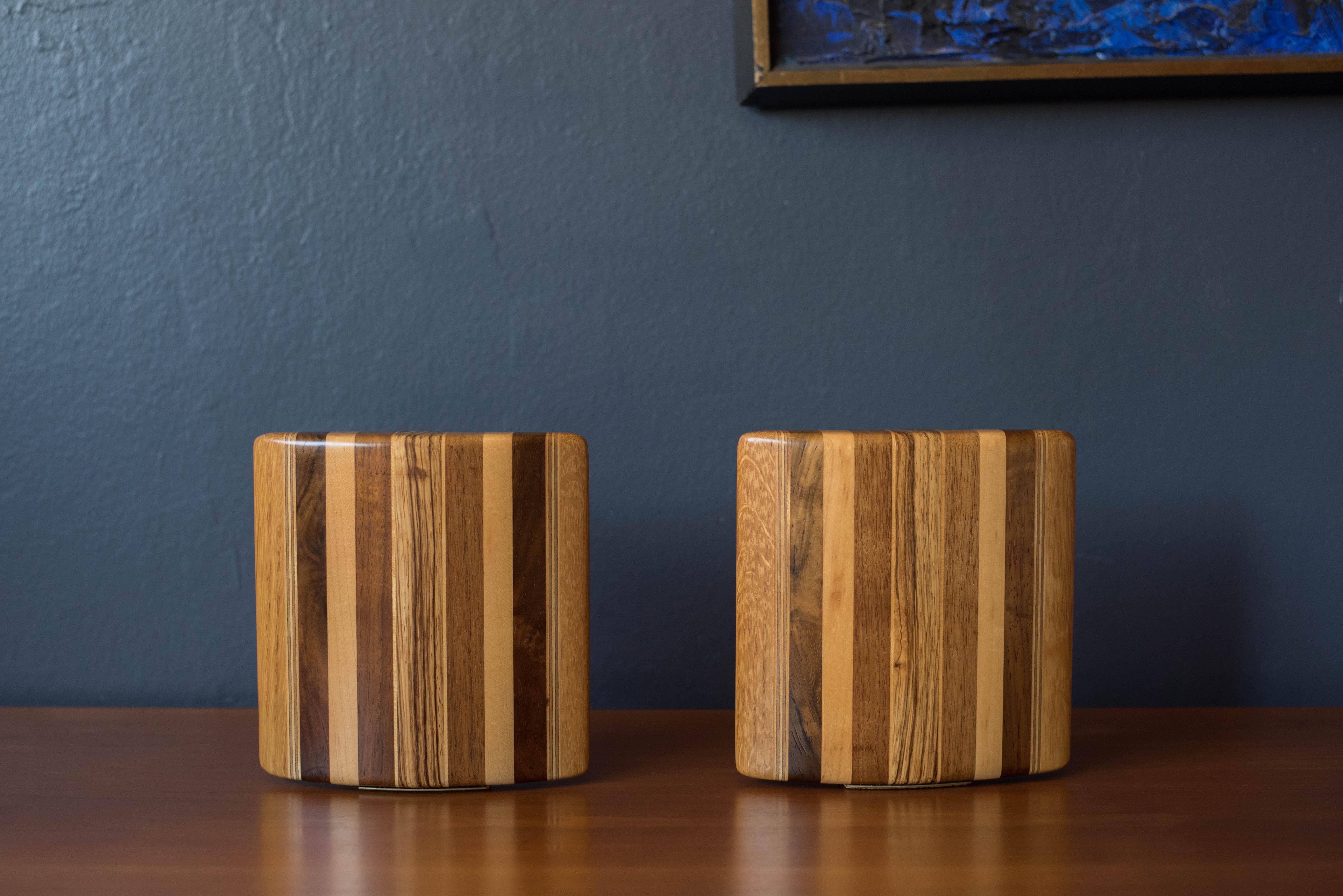 Vintage handmade studio solid planked mixed wood bookends, circa 1970s. This unique set is handcrafted in zebrawood, walnut, maple, oak, rosewood and plywood. Perfect to display with any Danish modern or contemporary decor. Price is for the pair.

 