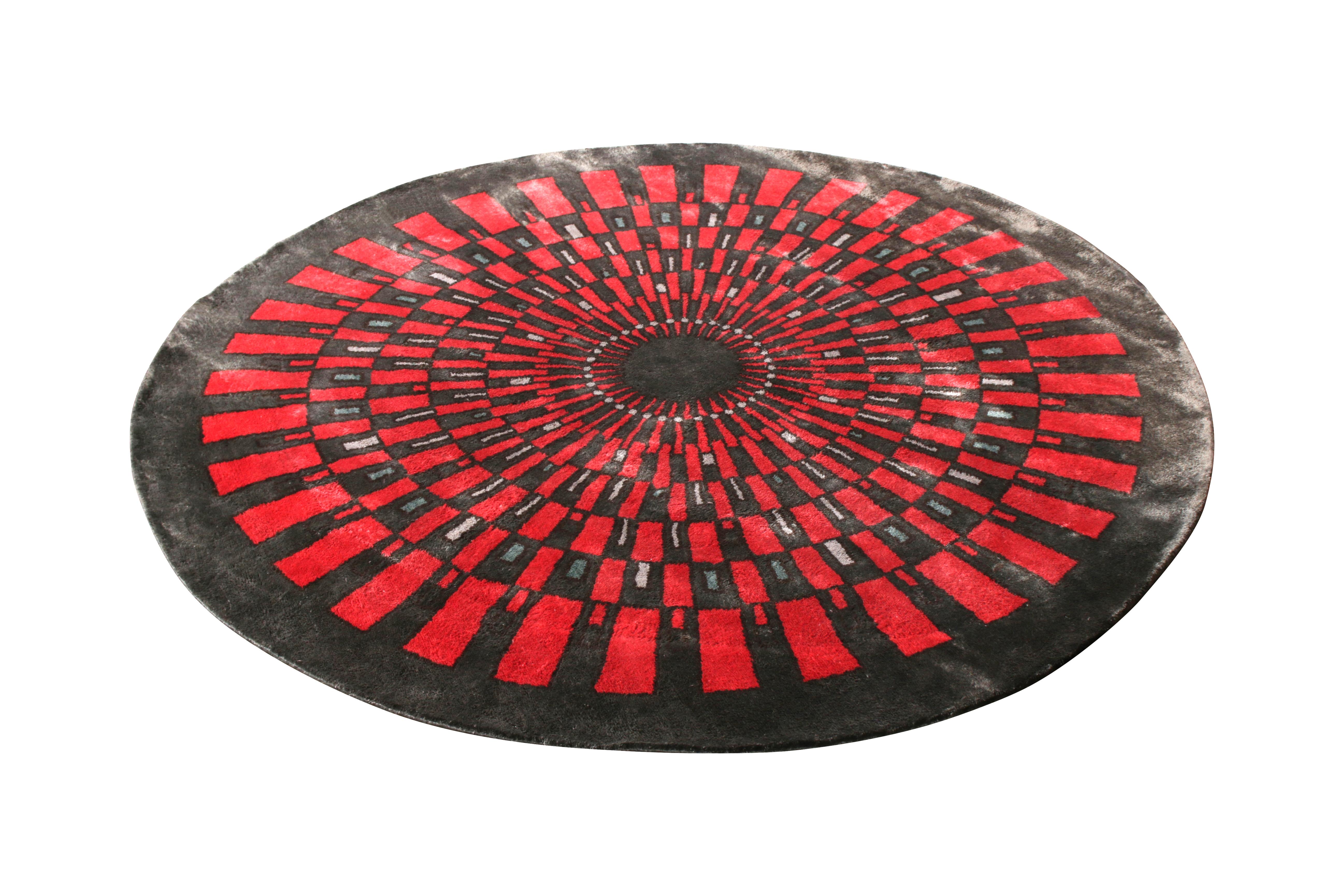 Hand-knotted in wool and all-natural silk, this 6′ circle rug hails from the Art Deco rug collection by Rug & Kilim.

Further on the Design: 

Connoisseurs may appreciate that this design draws on French Deco rug styles in its particular