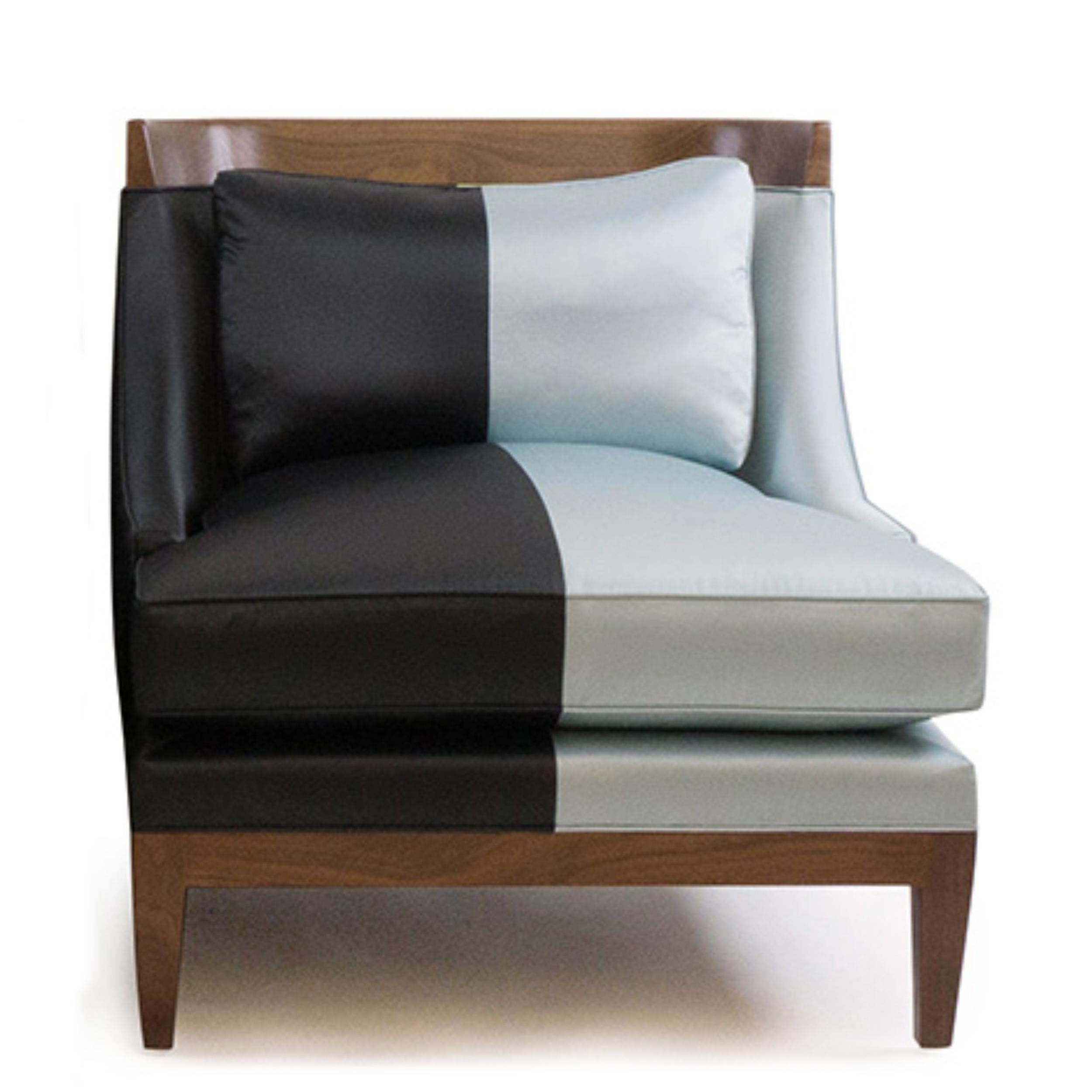 Club chair inspired by Mid-Century Modern style. Covered in black & blue silk combination. Deep seat is both comfortable and elegant. Extra-stuffed down/feather-wrapped foam loose seat cushion sits atop an 8-way hand tied spring base. Loose pillow