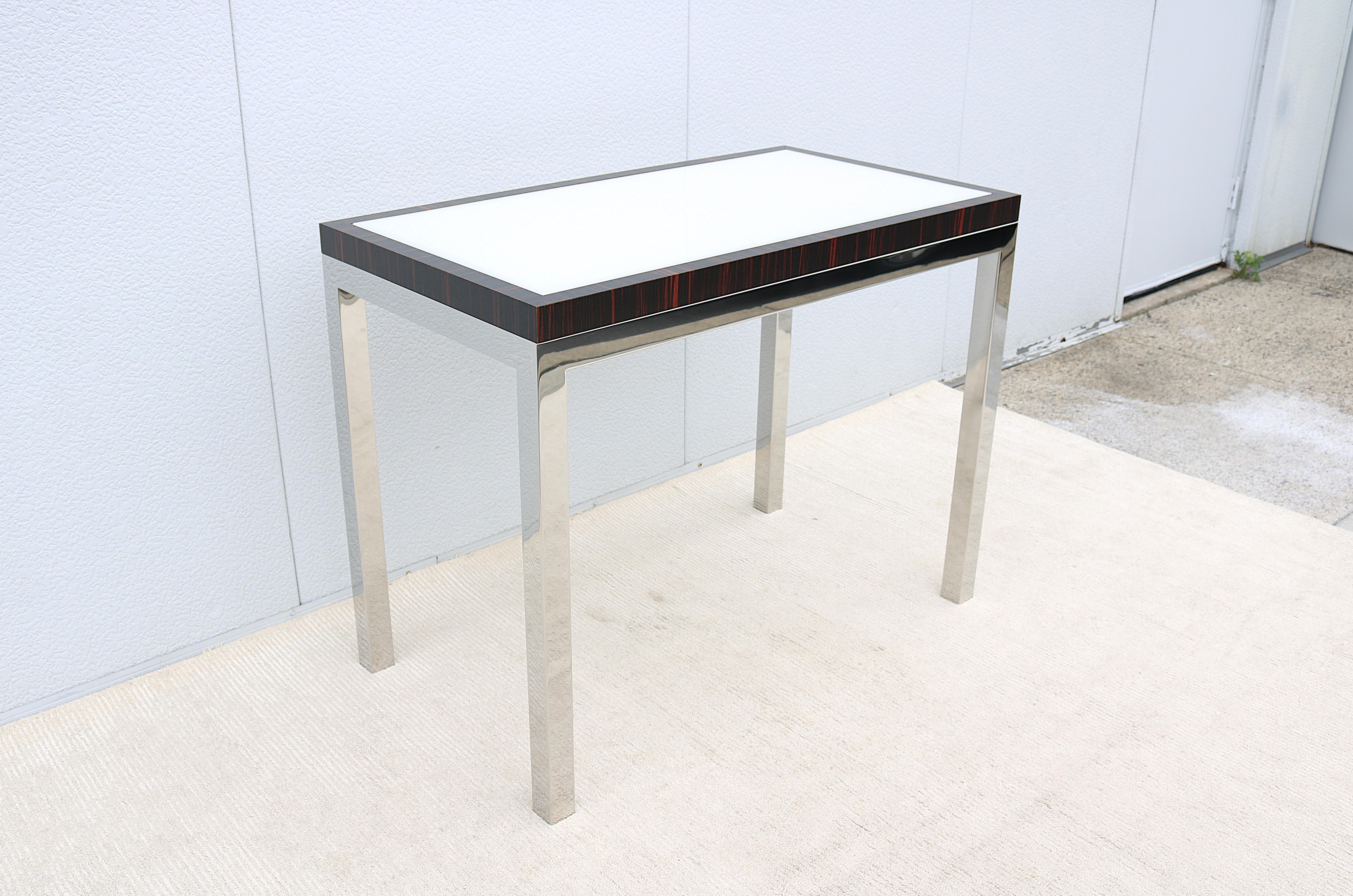 Mesa consola a media altura de estilo moderno de mediados de siglo atribuida a Leon Rosen Acero inoxidable en venta