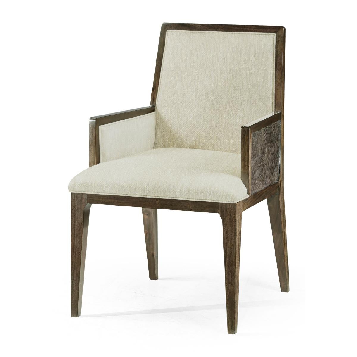 A Mid-Century Modern style greyed walnut dining chair with an upholstered back and seat and raised on square out flaring tapered legs. 

Arm dimensions: 22.25
