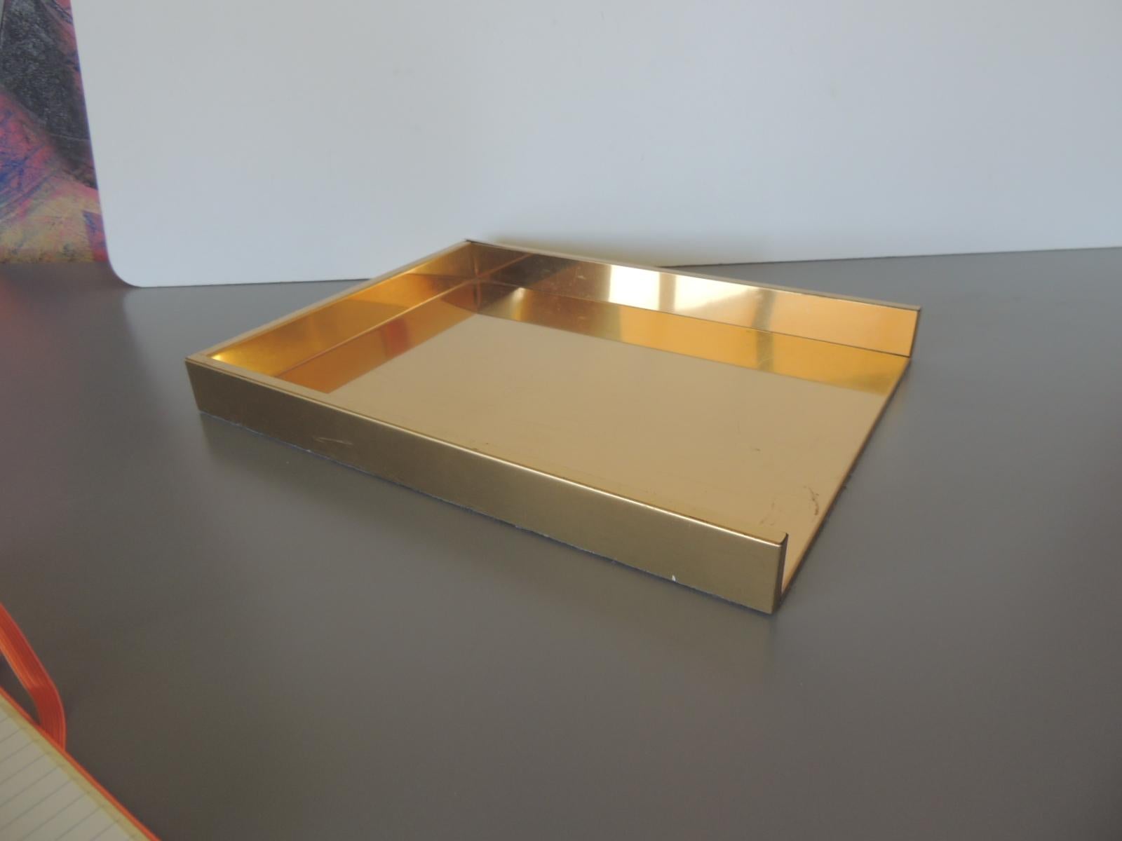 midcentury-Modern style gold tone desk letter tray.
In box tray.