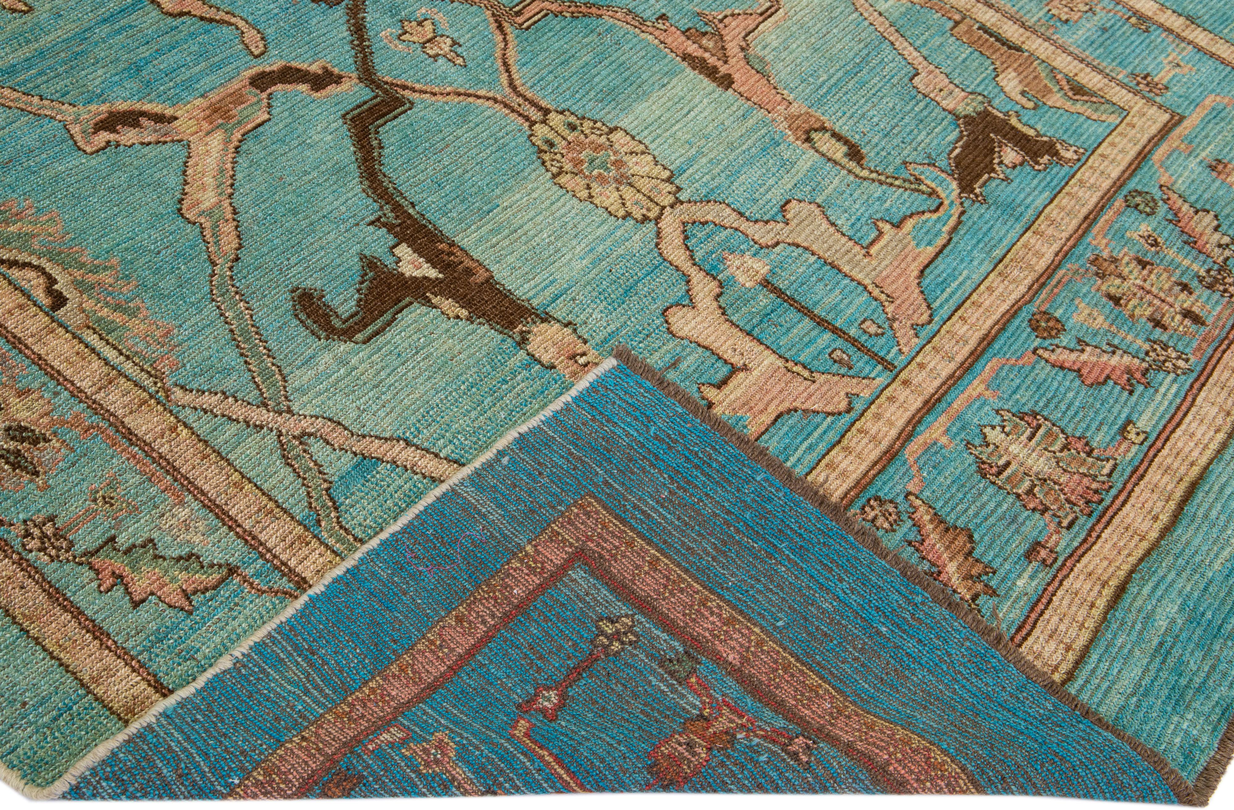 Beautiful Mid-Century Modern style rug Inspired by 19th-century regional artisans -- embodies a Classic, transitional look and modern style. This handmade wool rug makes part of our Northwest collection and features a teal color field and brown