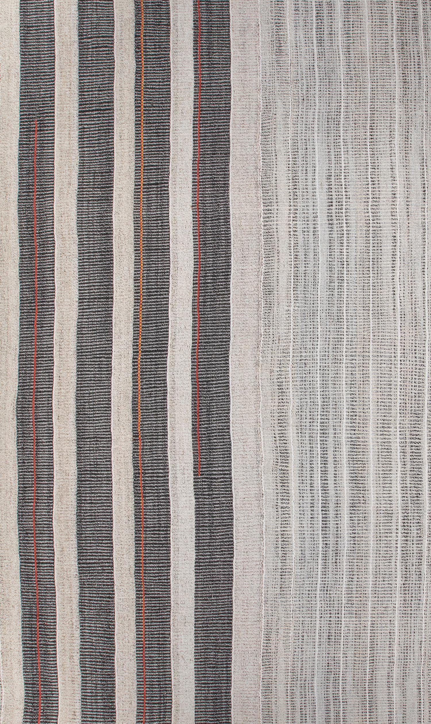 This Pelas flatweave rug is made with handspun wool and natural dyes.  It is inspired by the antique kilims that are native to the Kurdish region in Iran.  NASIRI continues their rich tradition of rug making by applying the same techniques and