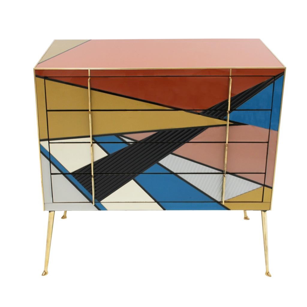 Mid-Century Modern style commode composed of four drawers. Original structure from 1950s made of solid wood and covered with colored Murano glass. Handles and legs made of solid brass. Designed by L.A. Studio and produced in Italy.

Every item LA