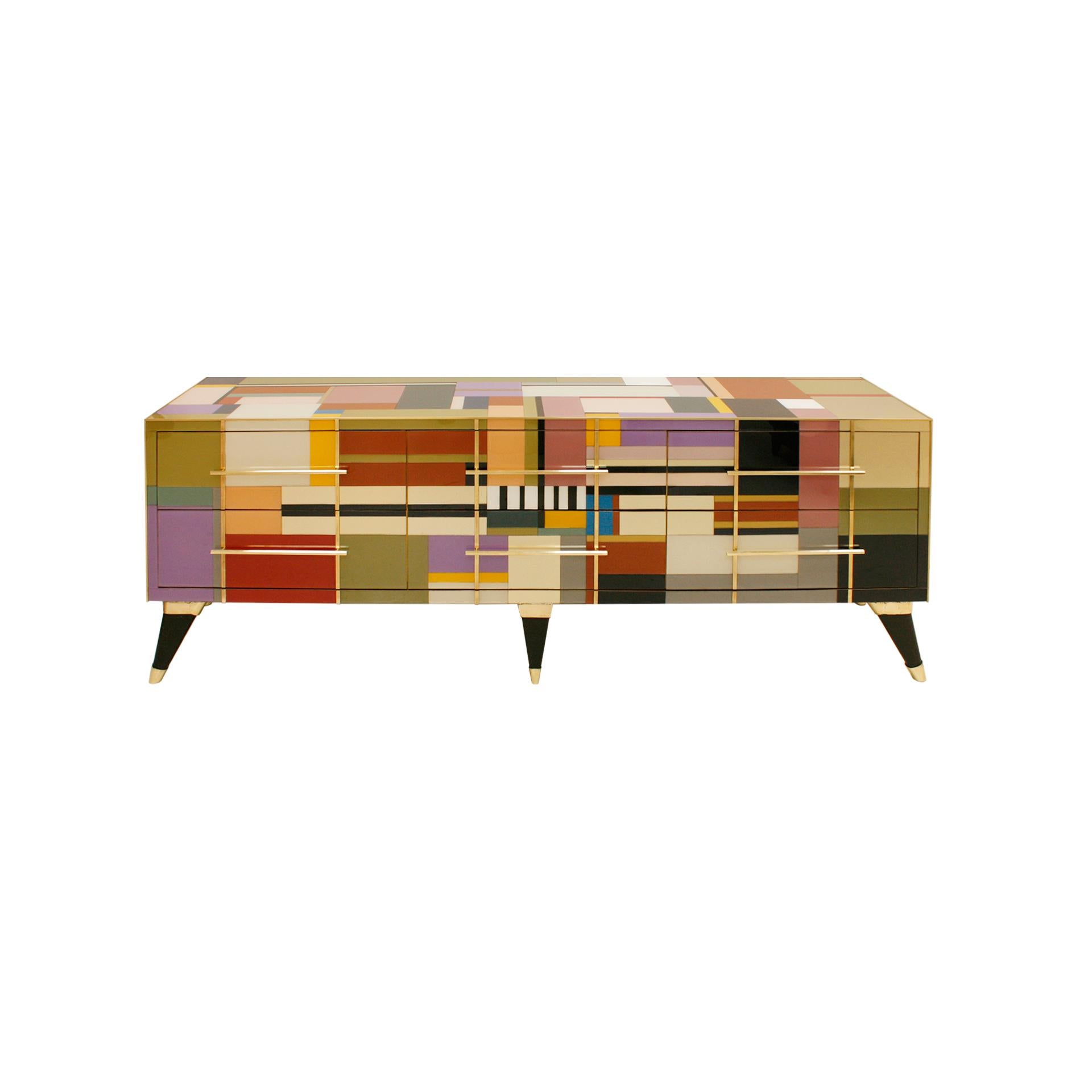 Italian sideboard designed by L.A. Studio. Made of solid wood structure, covered in colored glass. Brass profiles and handles. Composed of six drawers. Made in Italy.