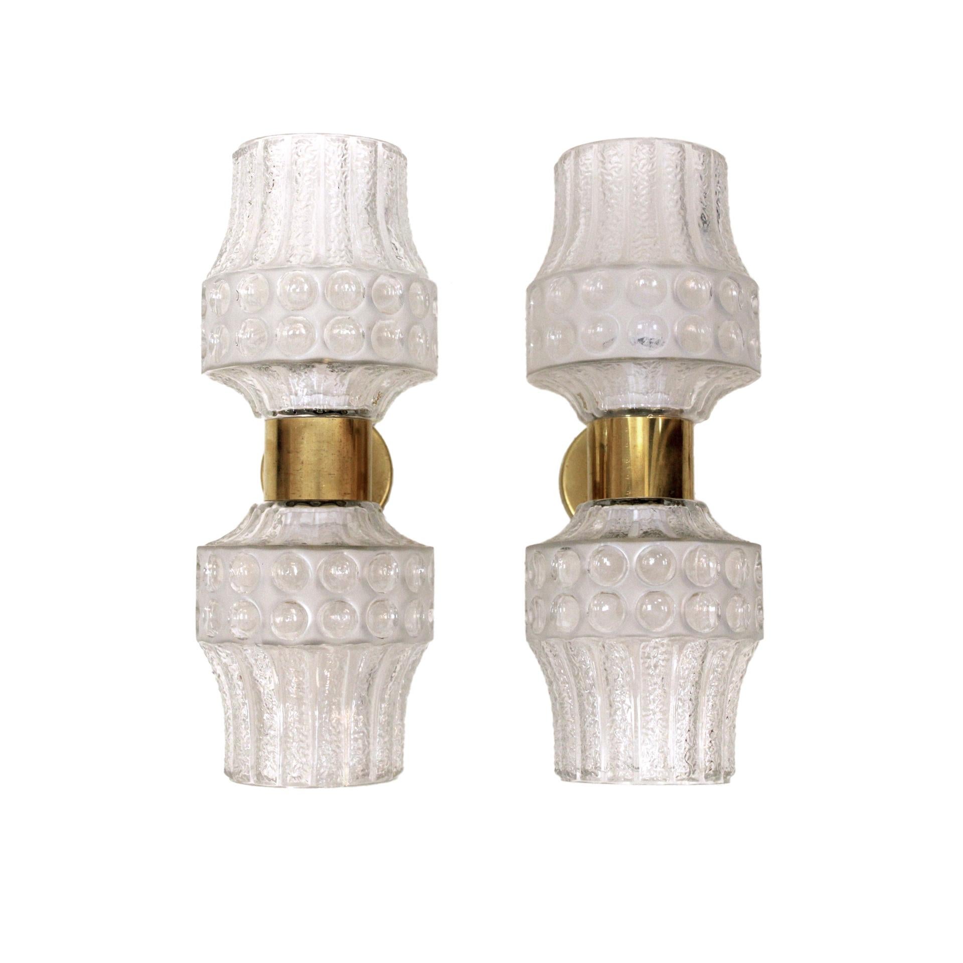 Pair of sconces, made with brass structure and hand carved murano glass. Italian manufacture.

Every item LA Studio offers is checked by our team of 10 craftsmen in our in-house workshop. Special restoration or reupholstery requests can be done.