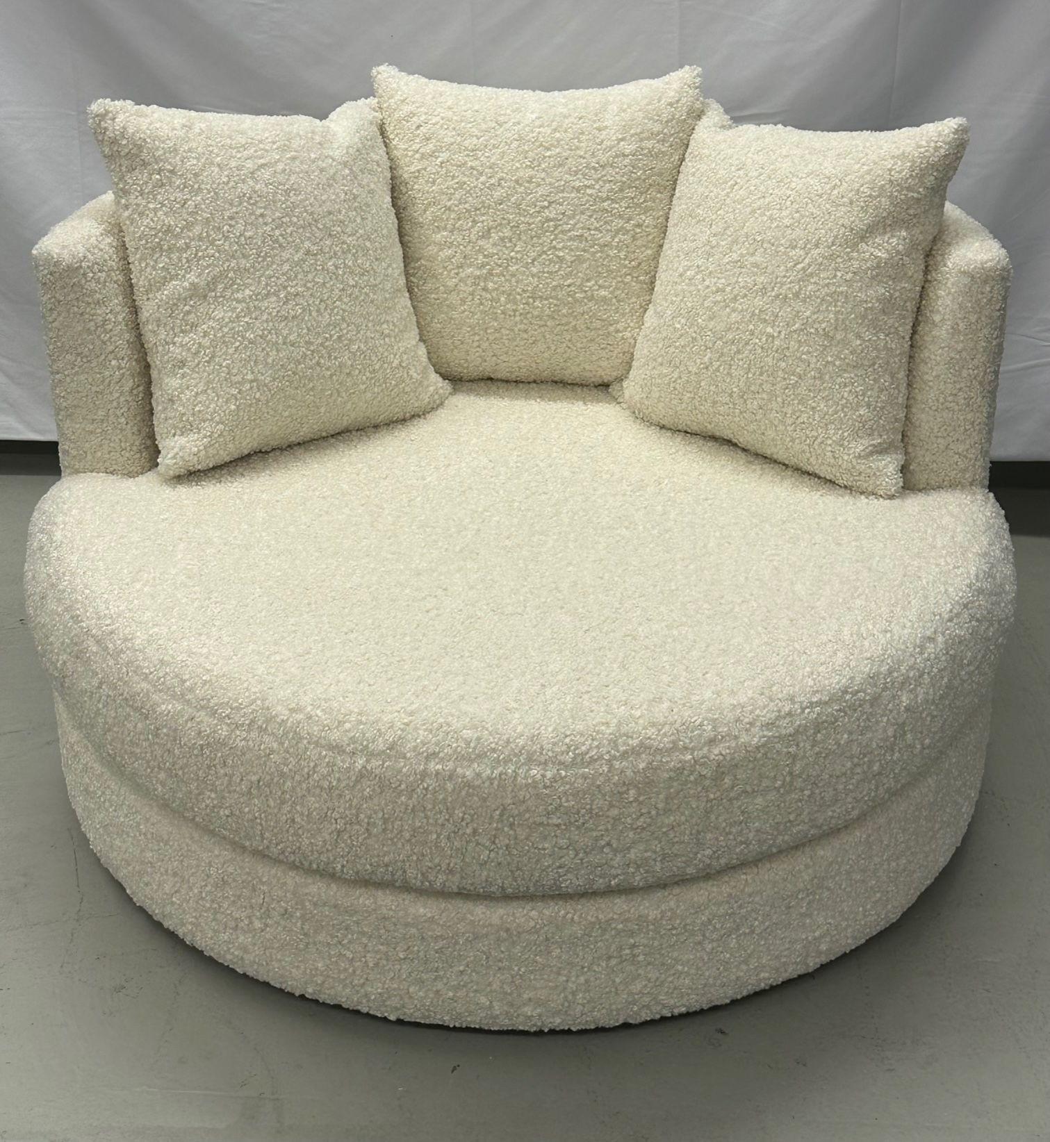 Mid-Century Modern style oversized white boucle swivel / lounge chair
 
Measures: 29.5 height x 50 diameter / SH 18