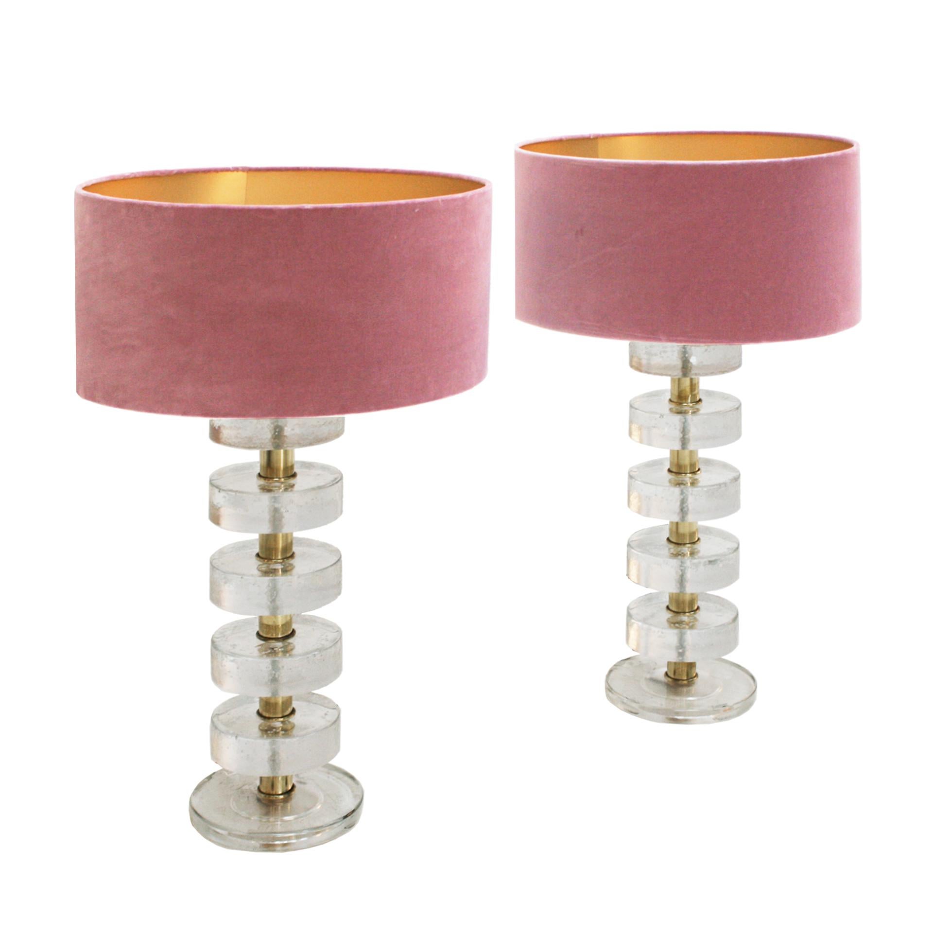 Pair of Italian table lamps made of independent pieces of thick Murano glass, carved and molded by hand with applications and brass structure.

Lamp structure dimensions: Diameter 20 x height 70 cm
Lampshades dimensions: Diameter 50 x height 25