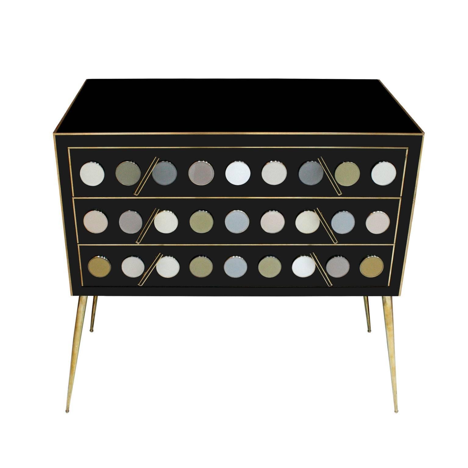 Italian commode composed of three drawers. Structure made of solid wood covered in Murano glass. Legs, handles and details are made of brass.

Every item LA Studio offers is checked by our team of 10 craftsmen in our in-house workshop. Special