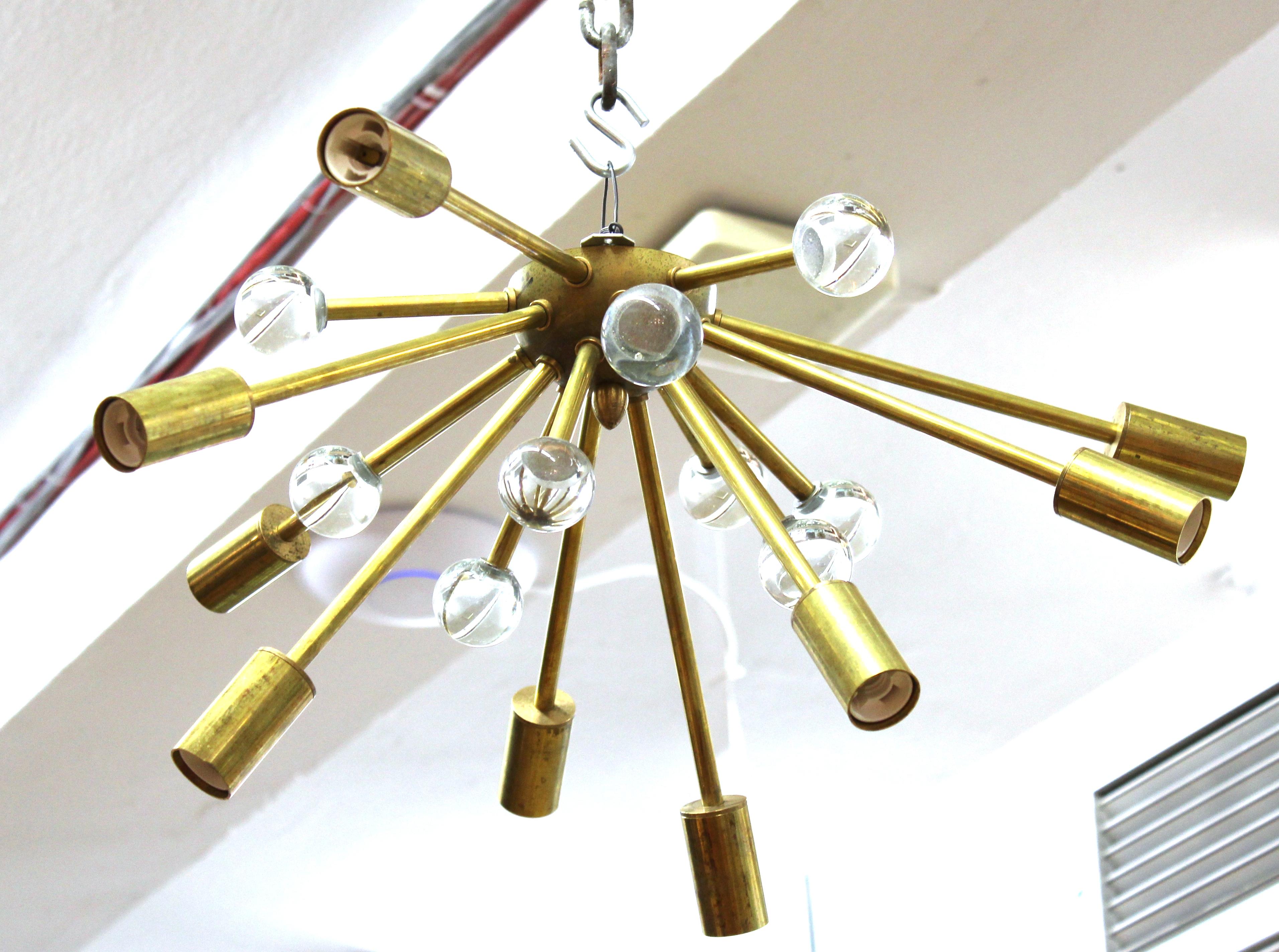 Mid-Century Modern Sputnik flush mount light in brass, with glass ball elements. In great vintage condition with age-appropriate wear.