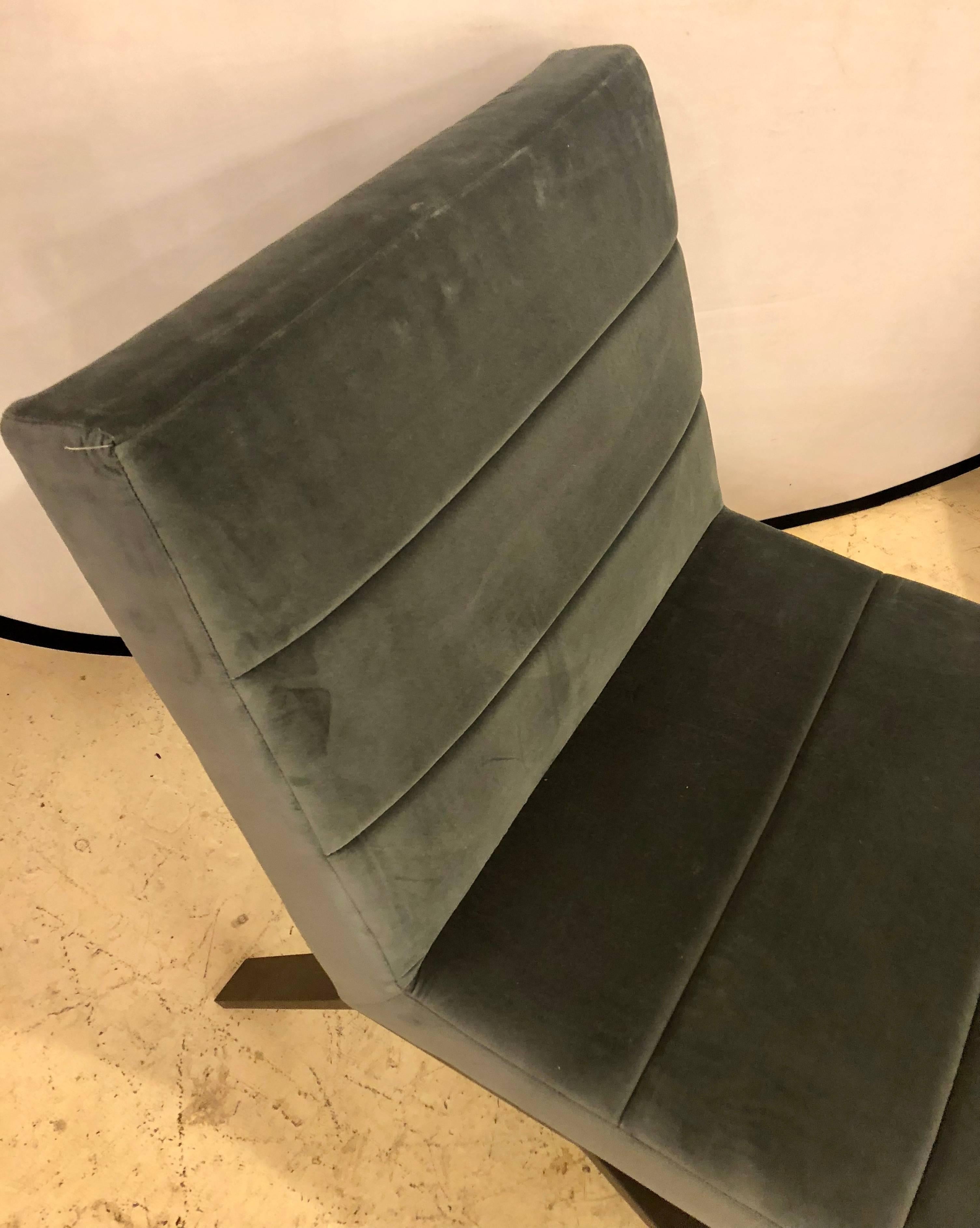 Mid-Century Modern style velvet side chair. This is a new, never sat in chair.