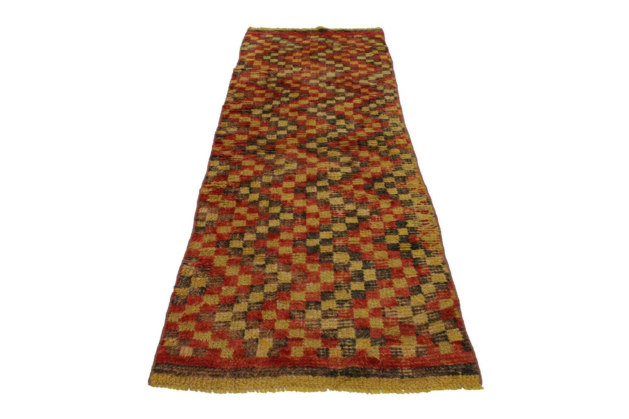 51682, Mid-Century Modern style vintage Turkish Oushak runner. Exciting and dynamic, this Mid-Century Modern style vintage Turkish Oushak runner features a zigzag checkerboard design extending the length of the rug. Versatile with brilliant earth
