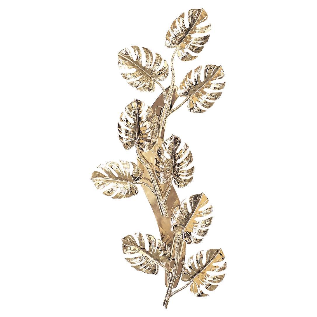 This wall light is a breathtaking tribute to the artistry of craftsmanship. Handcrafted gold-plated brass leaves capture the delicate essence of nature, while the contrast between sharp twigs and smooth curves creates a visually striking