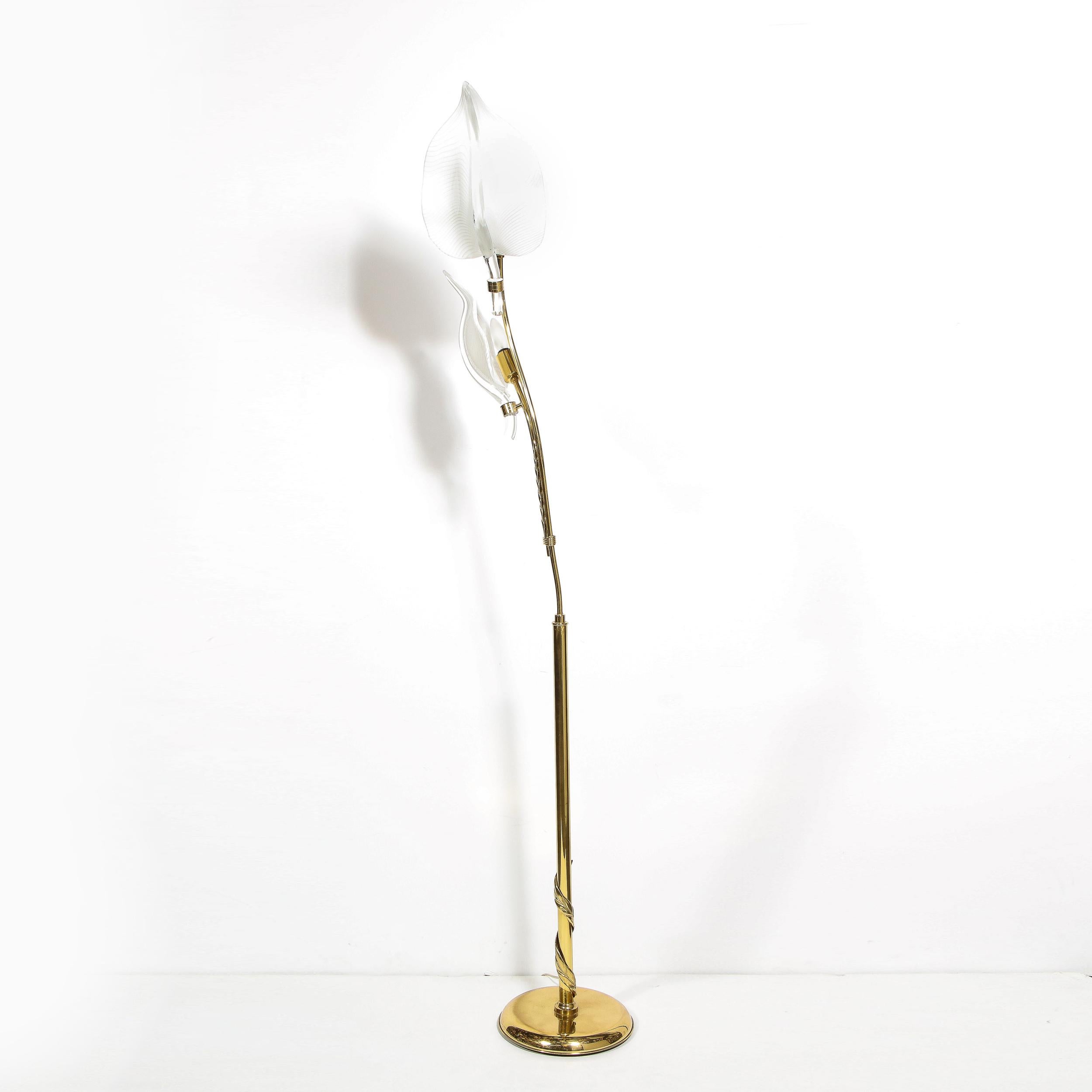 This refined Mid-Century Modern floor lamp was crafted by artisans in Murano, Italy- the island off the coast of Venice renowned for centuries for its superlative glass production, circa 1960. It features two hand blown undulating Murano white