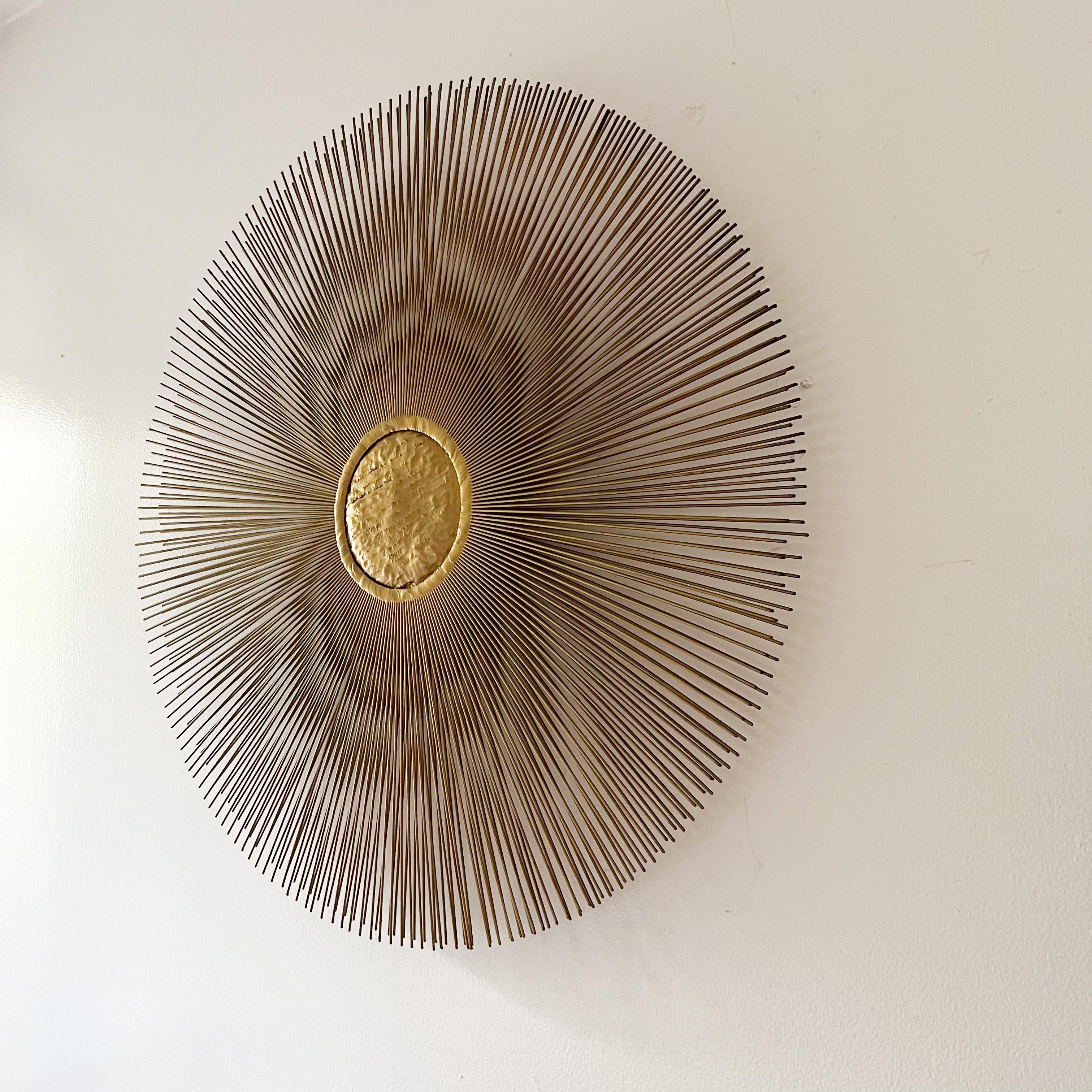 sunburst wall sculpture