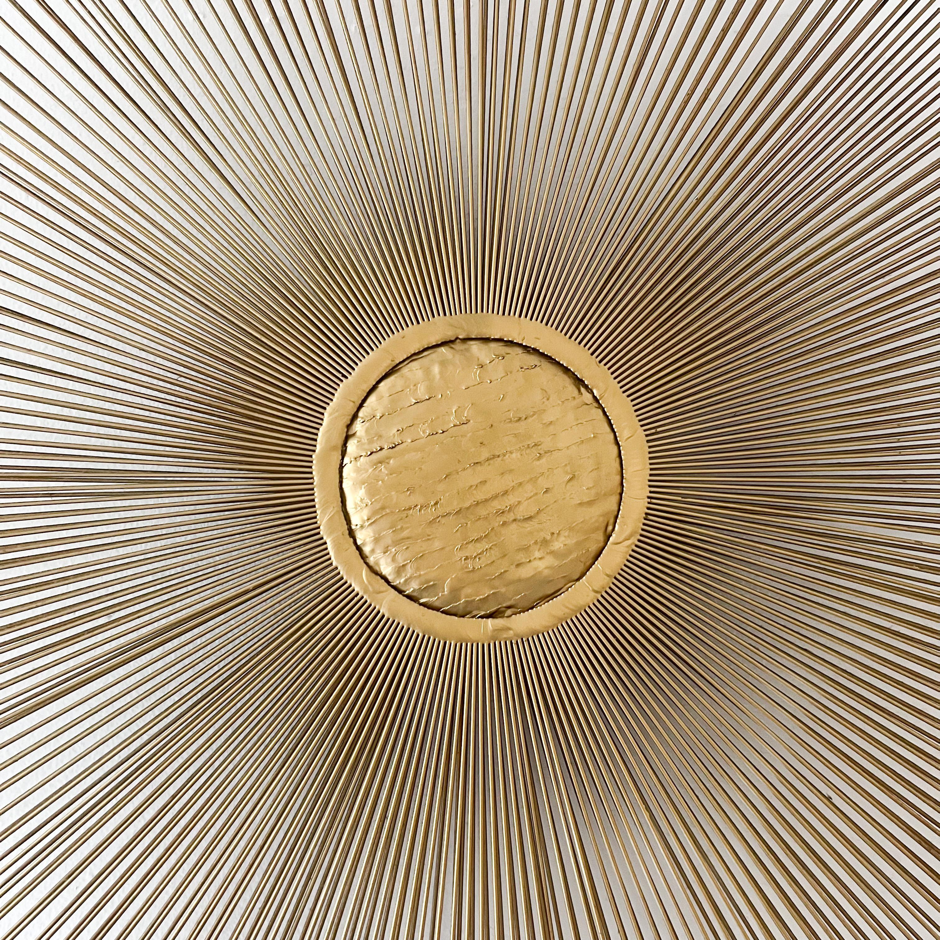brass sunburst wall art