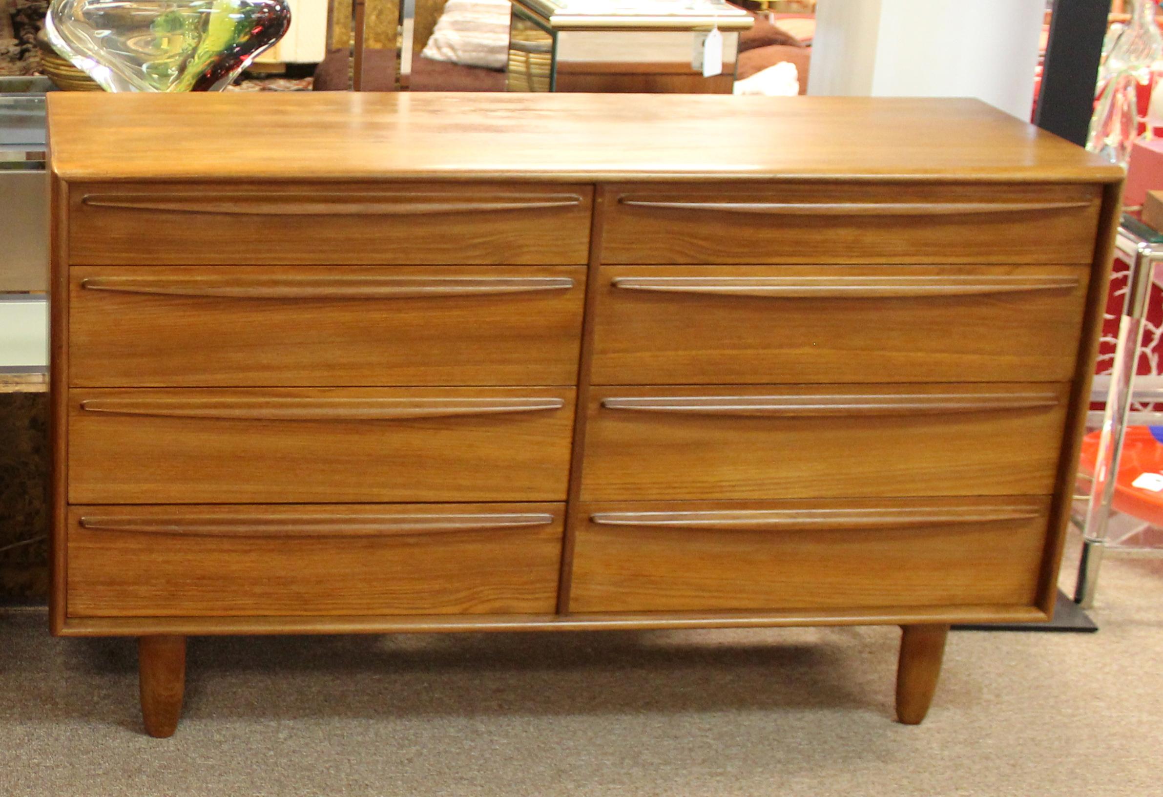 For your consideration is a stunning, teak dresser, with eight drawers, made in Denmark, by Svend Aage Madsen, circa 1960s. In excellent vintage condition. The dimensions are 54