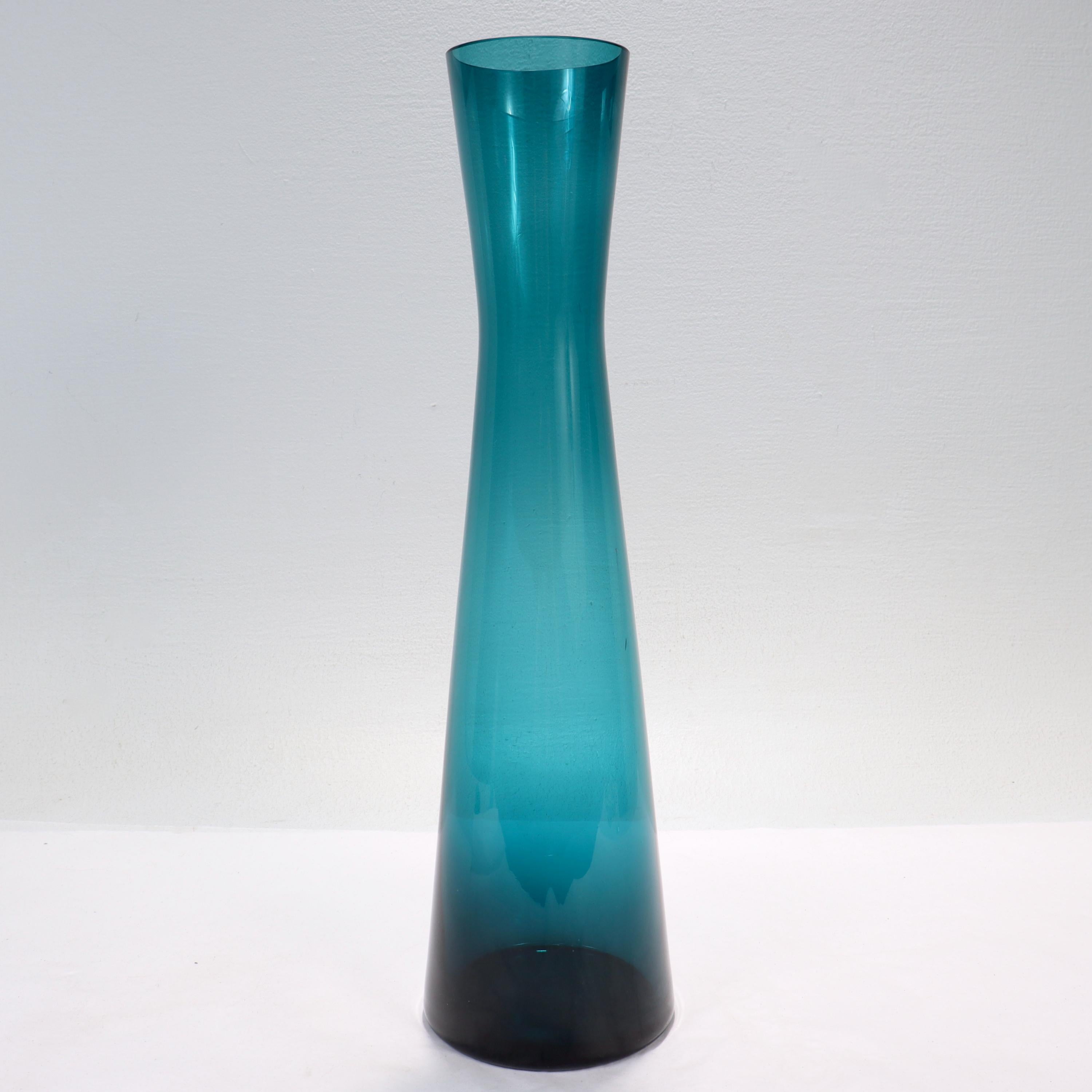 A fine Mid-Century Modern art glass vase.

Attributed to Gullaskruf.

Simply a great vase!

Date:
Mid-20th Century

Overall Condition:
It is in overall good, as-pictured, used estate condition with no chips, cracks, or repairs, some fine &