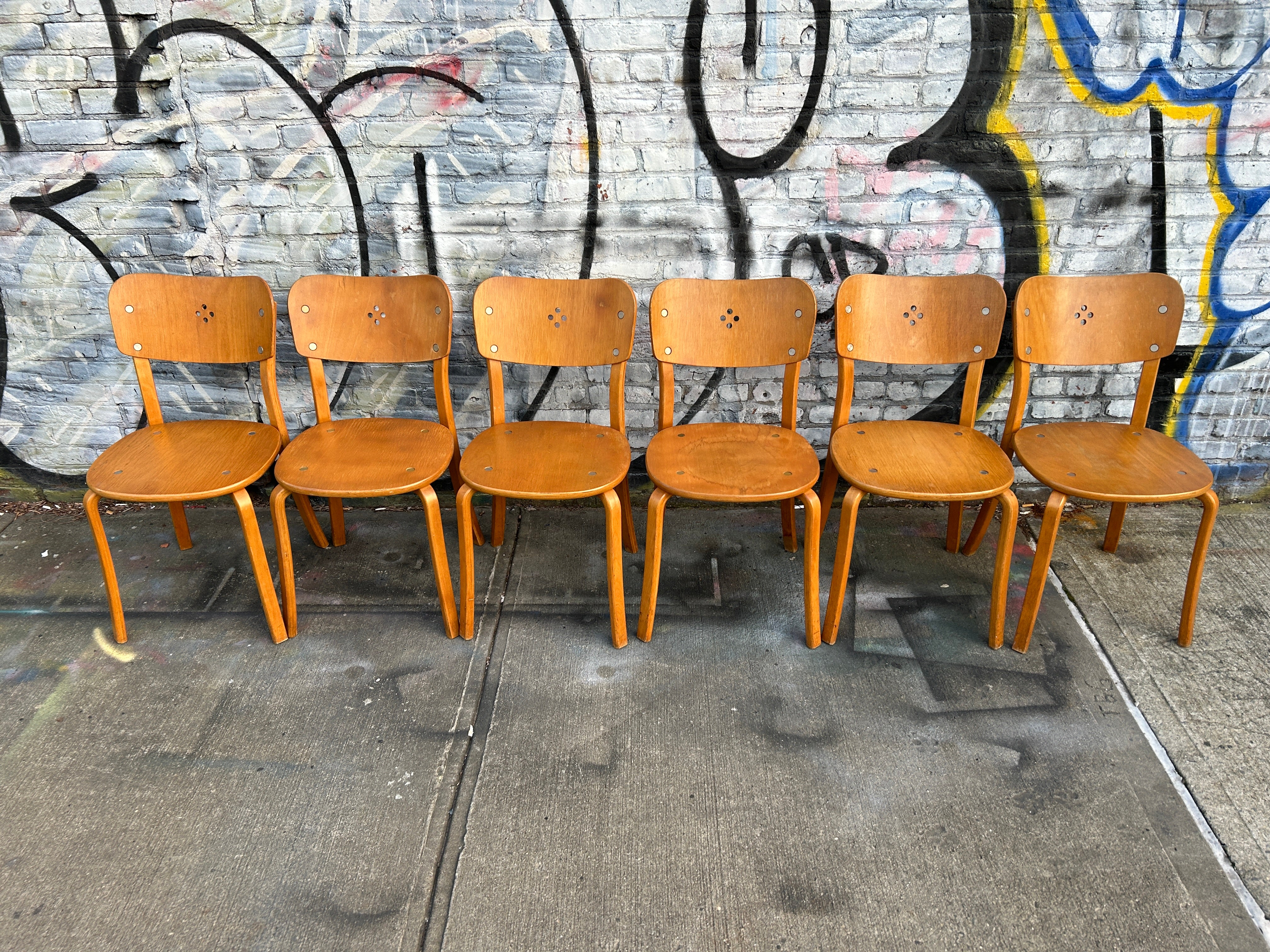 Mid-Century Modern Swedish Modern set of 6 bentwood Dining chairs. Great minimalist design. Legs bolt on underneath with bentwood legs and back with 4 center accent holes in backrest. Very Unique chairs. Matching set of 6 chairs. No labels or marks.