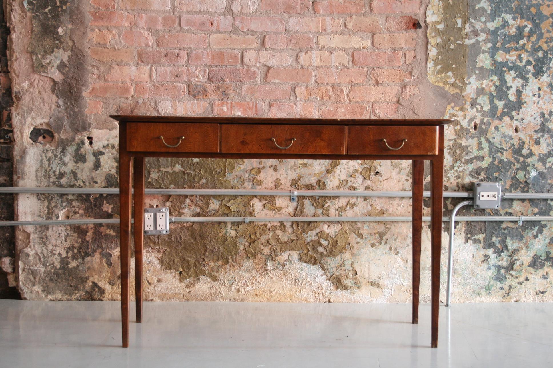 Mid-Century Modern Swedish rosewood console table after Josef Frank in good vintage original condition.