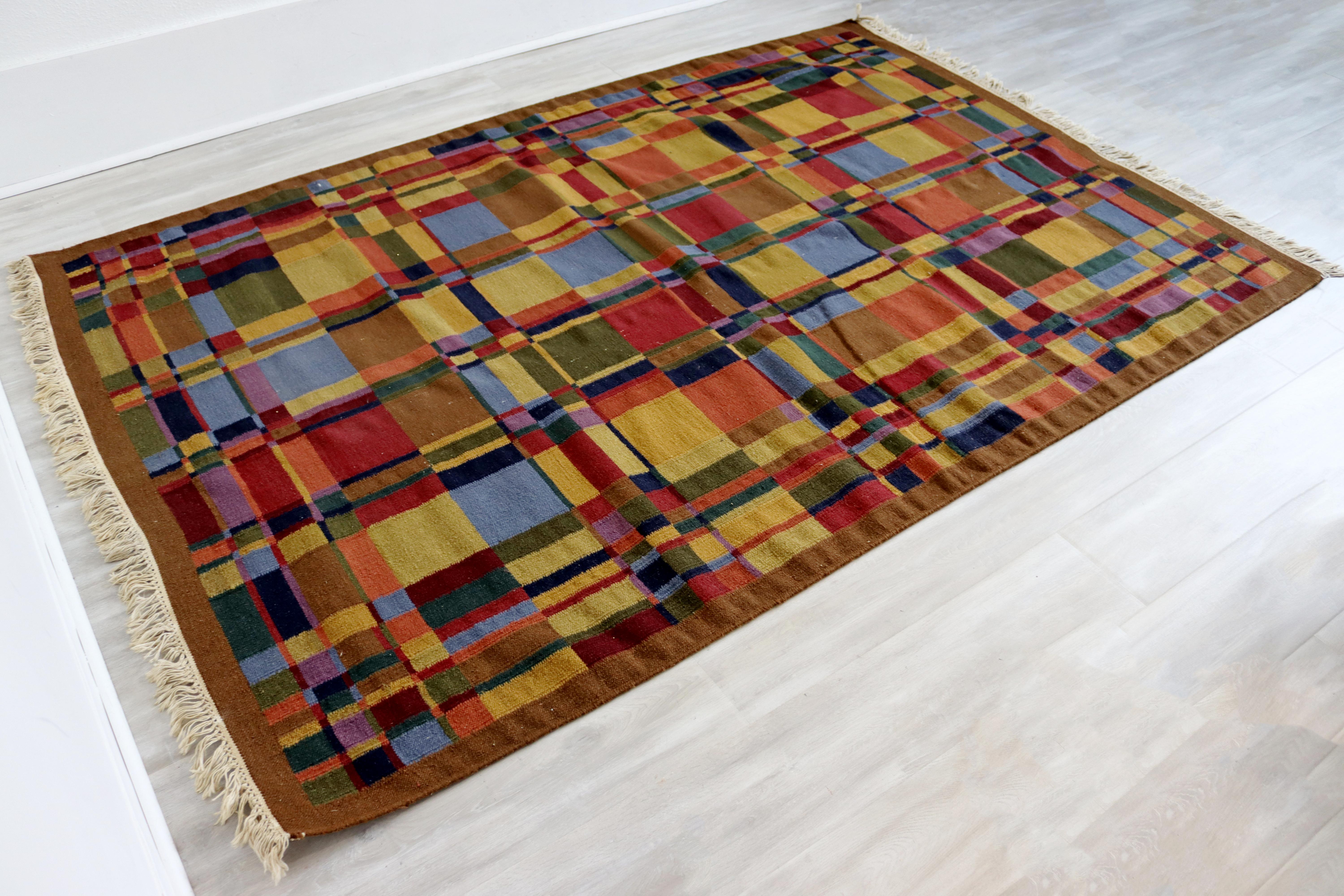 For your consideration is a wonderful, multi-colored, flat weave wool, rectangular area rug, made in Sweden, circa the 1960s. In very good vintage condition. The dimensions are 92