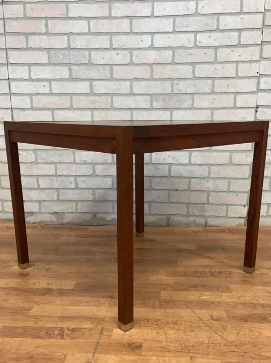 Mid Century Modern Swedish Square Coffee Table By DUX

This gorgeous mid century modern Scandinavian square coffee table with bronze tip legs. The wood has been laid to reveal a beautiful checkered pattered. The table was made in Sweden by Dux of
