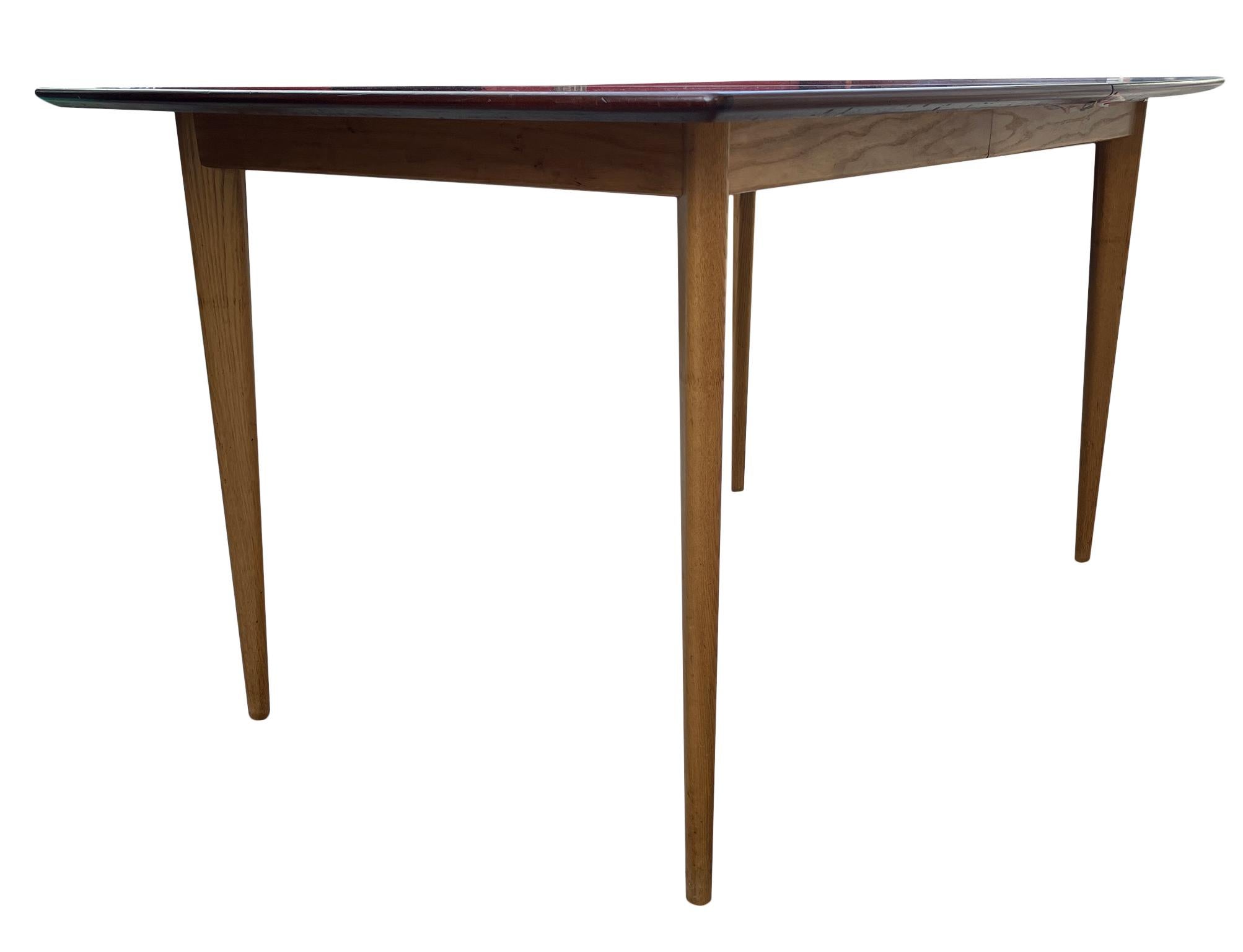 Mid Century Modern Swedish teak Dining table with 2 leaves  In Good Condition In BROOKLYN, NY