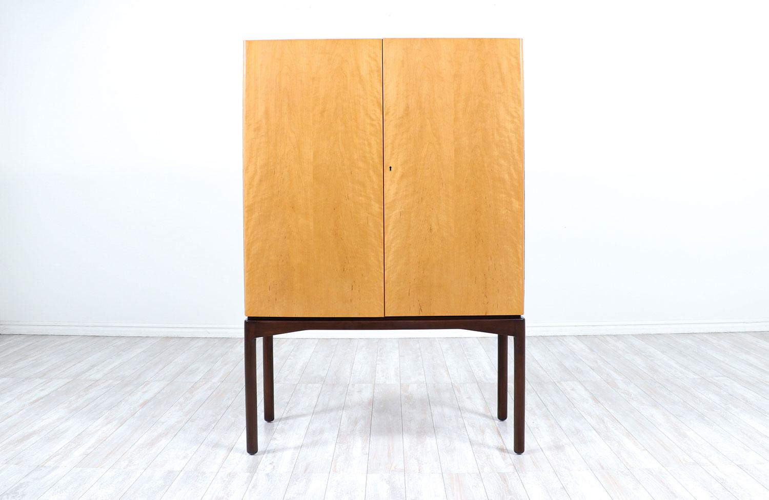 Mid-Century Modern Swedish two-tone cabinet by Ferd Lundquist.