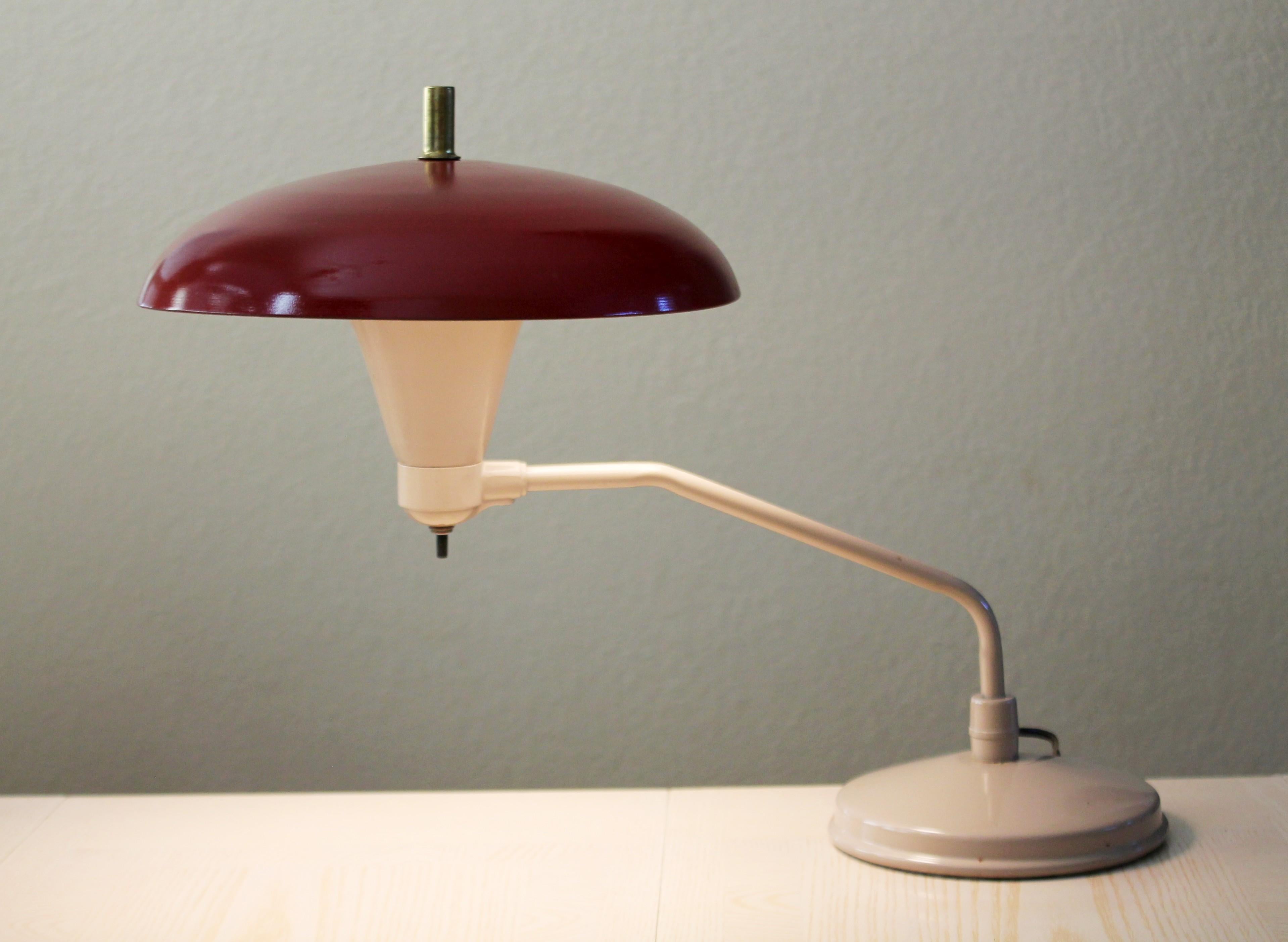 Absolutely Gorgeous!

Mid Century
Articulating Swing Arm 
Reflecting Saucer Desk/Table Lamp

Red & Cream Enamel

Great vintage condition!

16