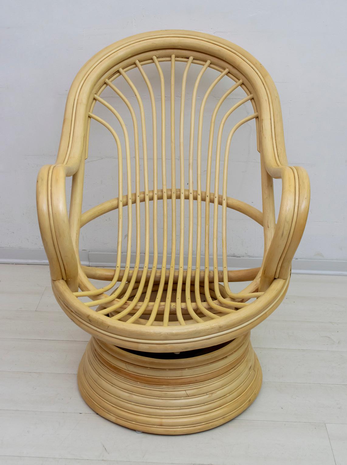 Exclusive wicker and bamboo swivel rocking chair. It has a round seat with a rocking mechanism.
