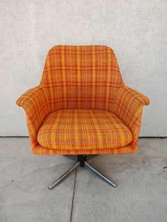 Mid Century Modern Swivel Armchair with its original orange fabric, Germany 1960
