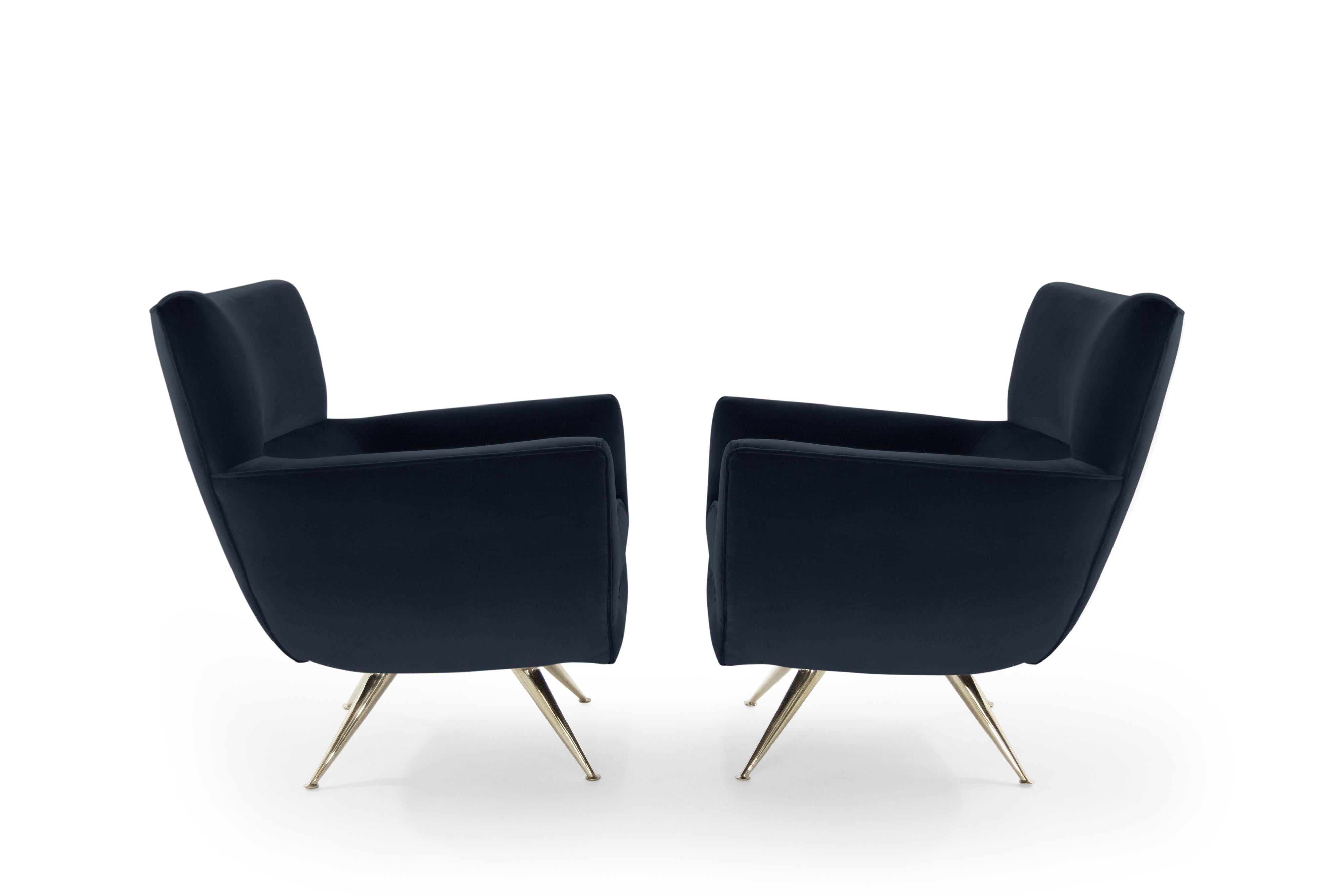 Incredibly rare pair of swivel chairs on brass legs designed by Henry Glass, circa 1950s. Newly upholstered in Great Plains cotton velvet (Midnight) by Holly Hunt. Newly brass-plated legs. Fabric samples available upon request.