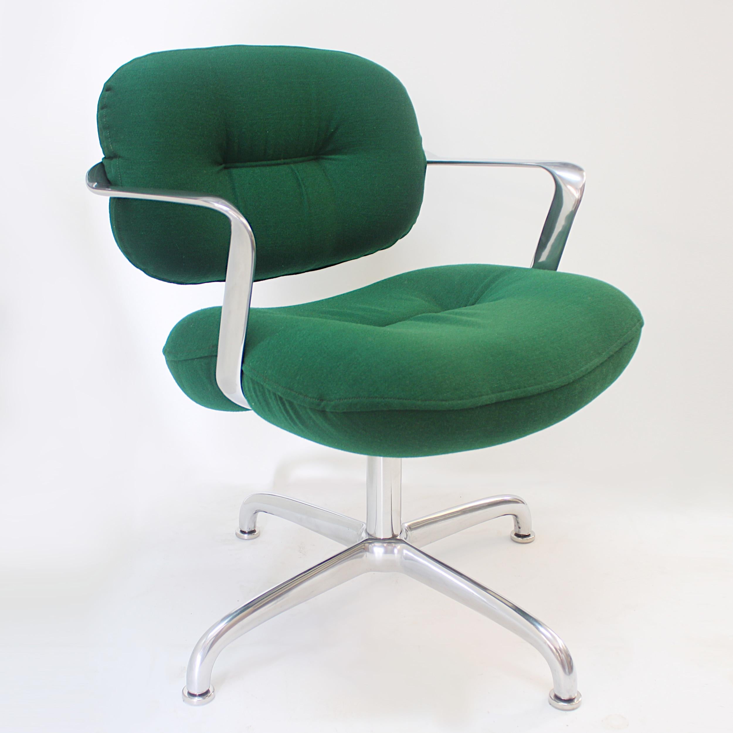 Arguably one of the most elegant desk chair designs from the midcentury era, this Morrison/Hannah design for Knoll Studios is utilitarian sculpture at its best. Chair features a curvaceous, cast-aluminum frame, Green tufted cushions, and aluminum