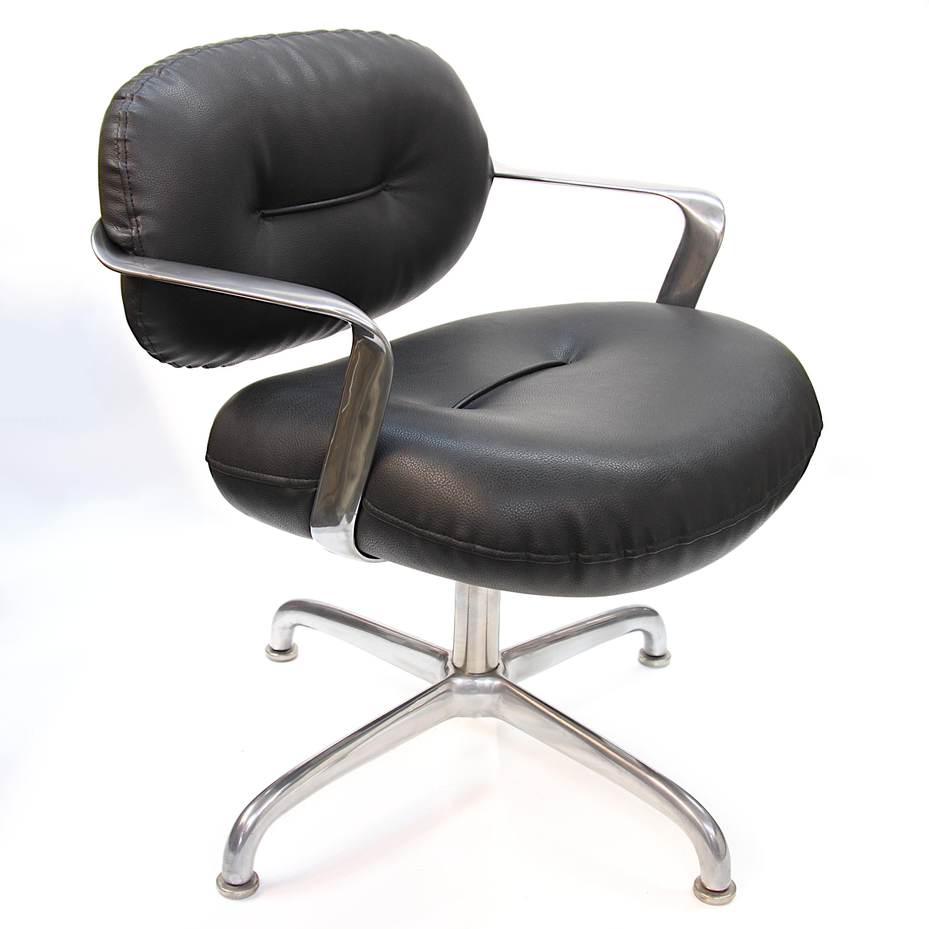 Arguably one of the most elegant desk chair designs from the midcentury era, this Morrison/Hannah design for Knoll Studios is utilitarian sculpture at its best. Chair features a curvaceous, cast-aluminum frame, black leather tufted cushions, and