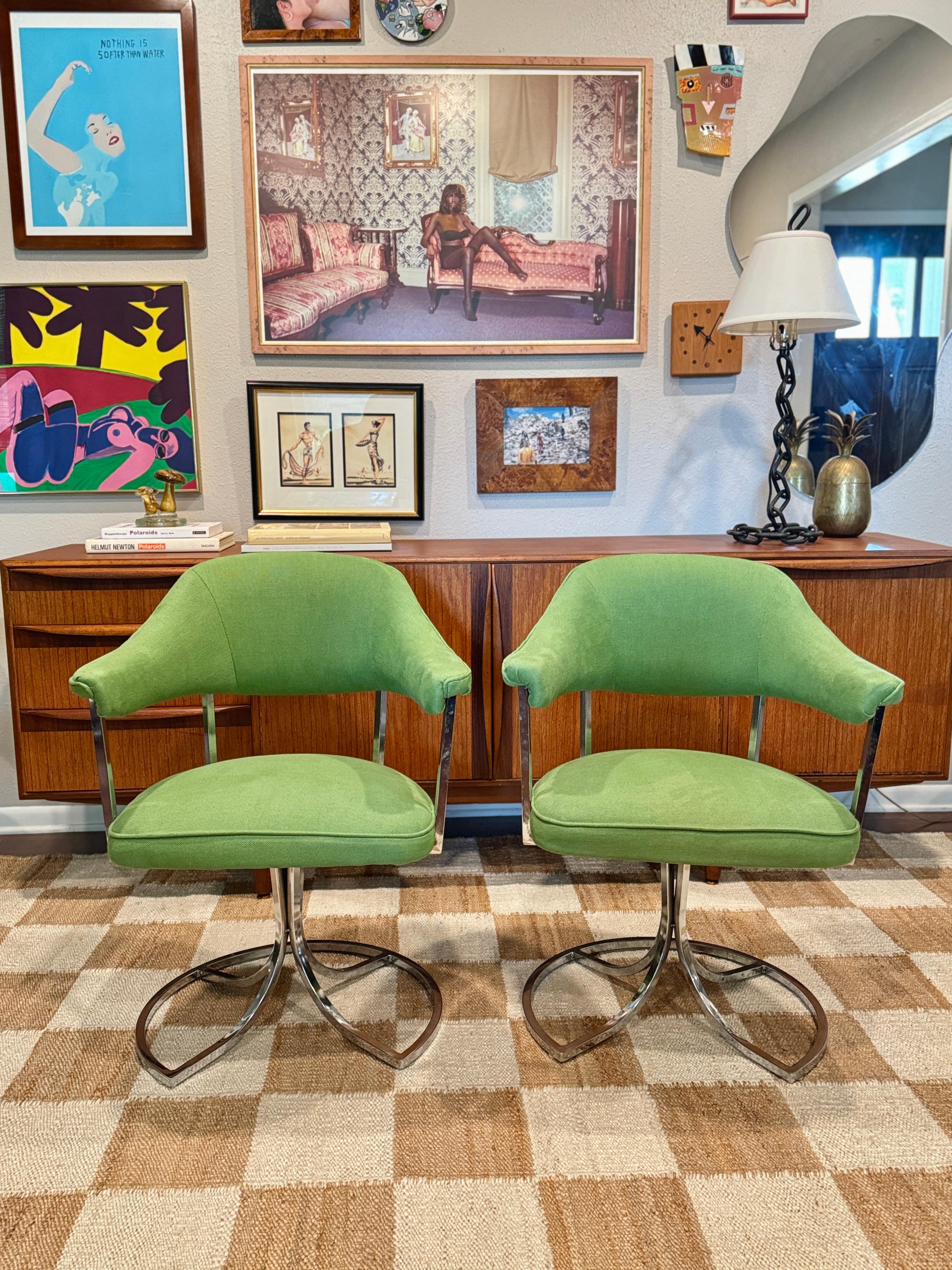 Stylish mid century modern swivel tulip chairs by Cal-Style Furniture, circa 1980s. Recently reupholstered in a high performance grass green linen blend fabric by Schumacher. Overall in very good condition with some expected wear to the chrome
