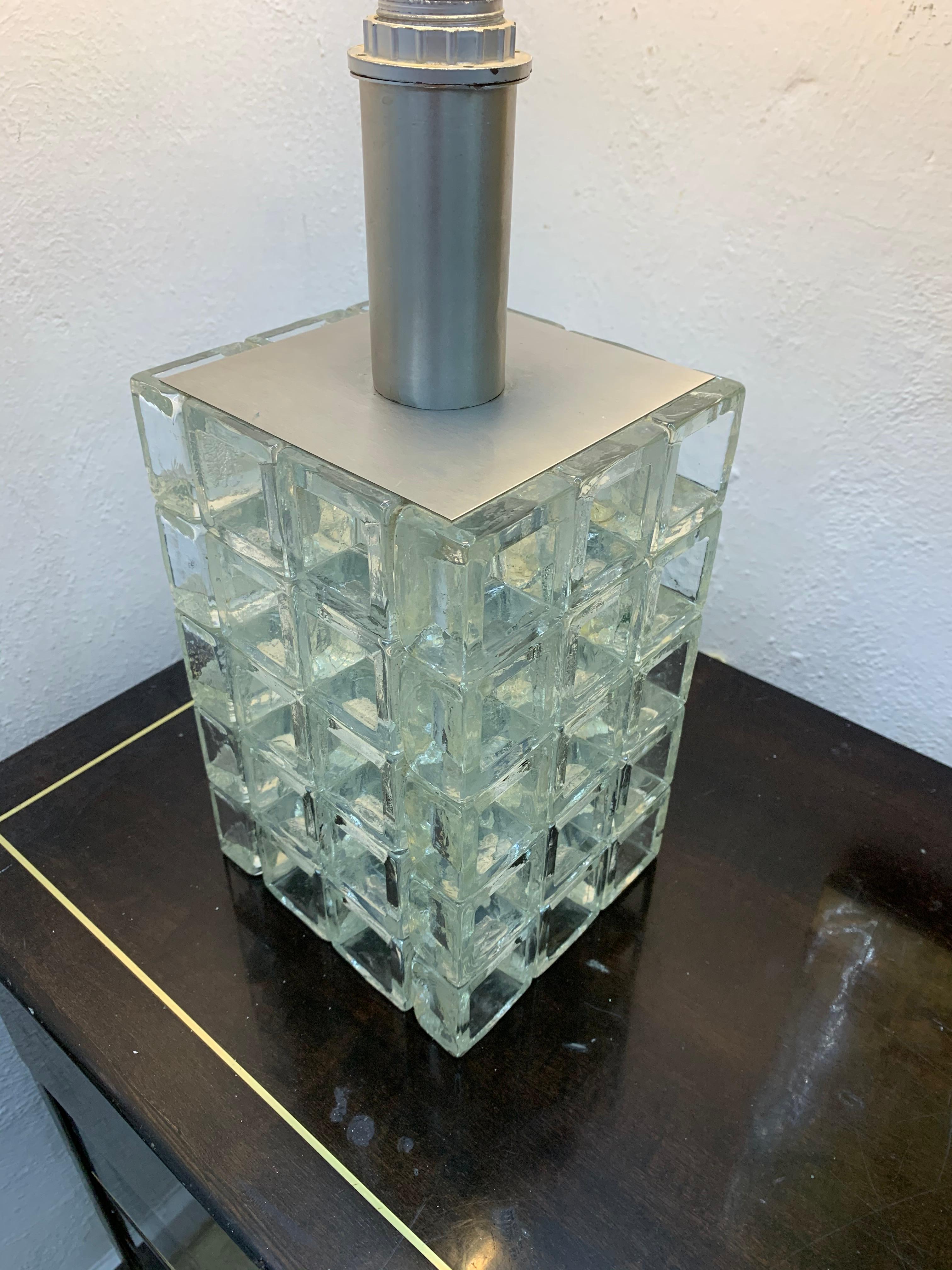 Mid-Century Modern table lamp, designed by Albano Poli for Poliarte glass in Murano glass.
Italy, circa 1960s.
Measurements of the glass body (not including the bulb holder) are:
Measures: 27cm H x 18cm W x 18cm D
The lamp is sold without a
