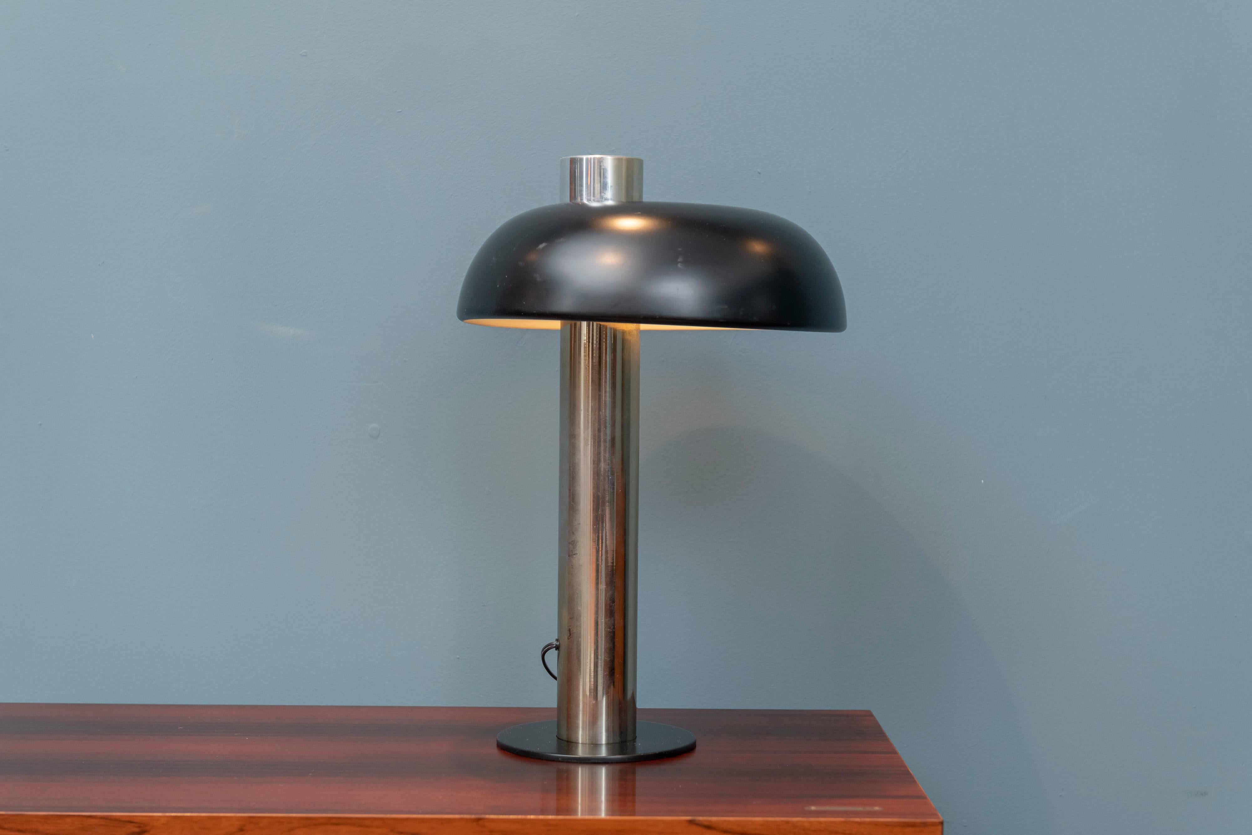 Mid-Century Modern table lamp by Laurel lamp Co. Chrome and black lacquer lamp in overall good vintage condition.