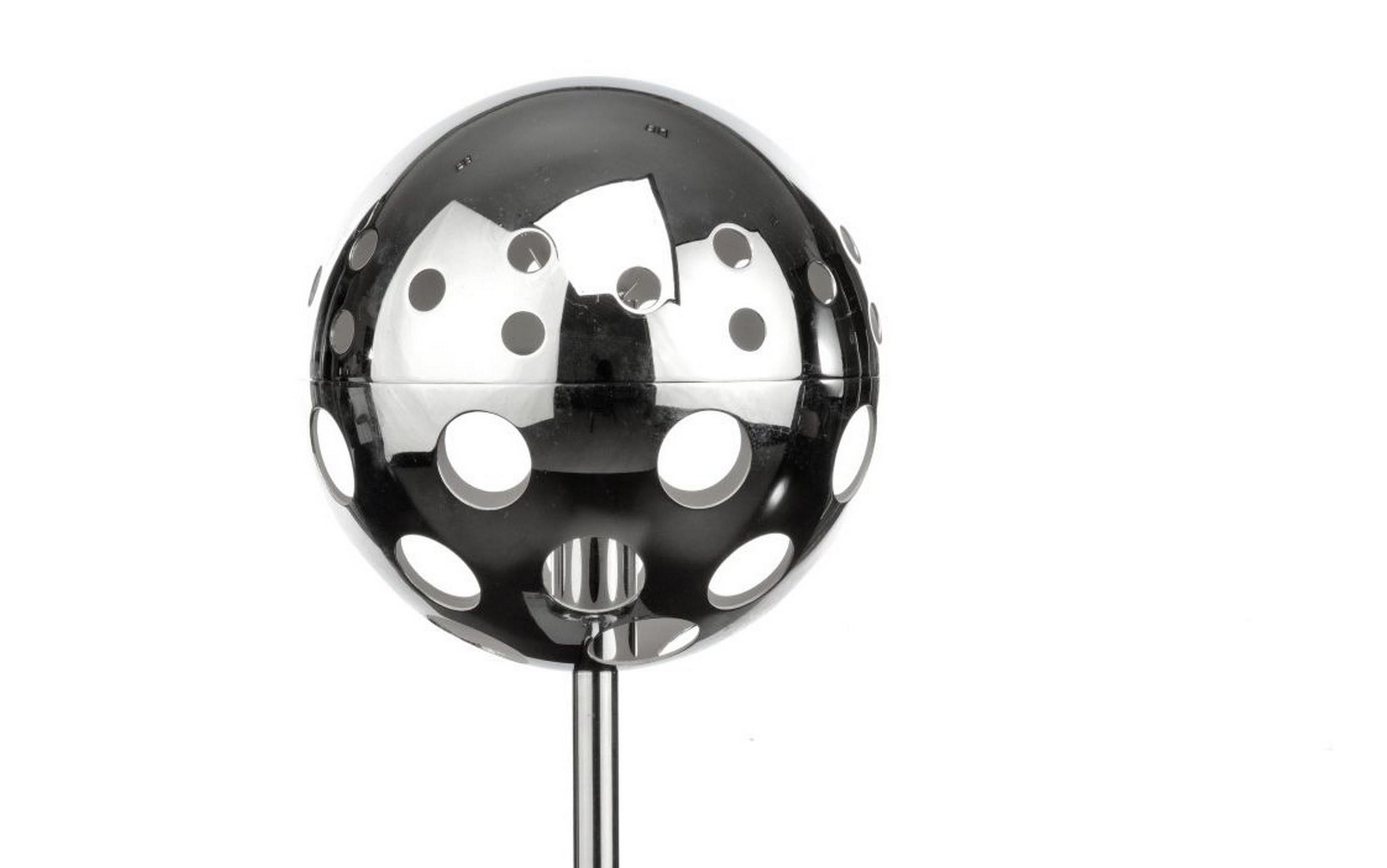 Polished chrome table lamp with spherical shade pierced with holes to allow the light to exit. This gives a very decorative effect in the room. The top of the sphere is removable to replace the bulb.