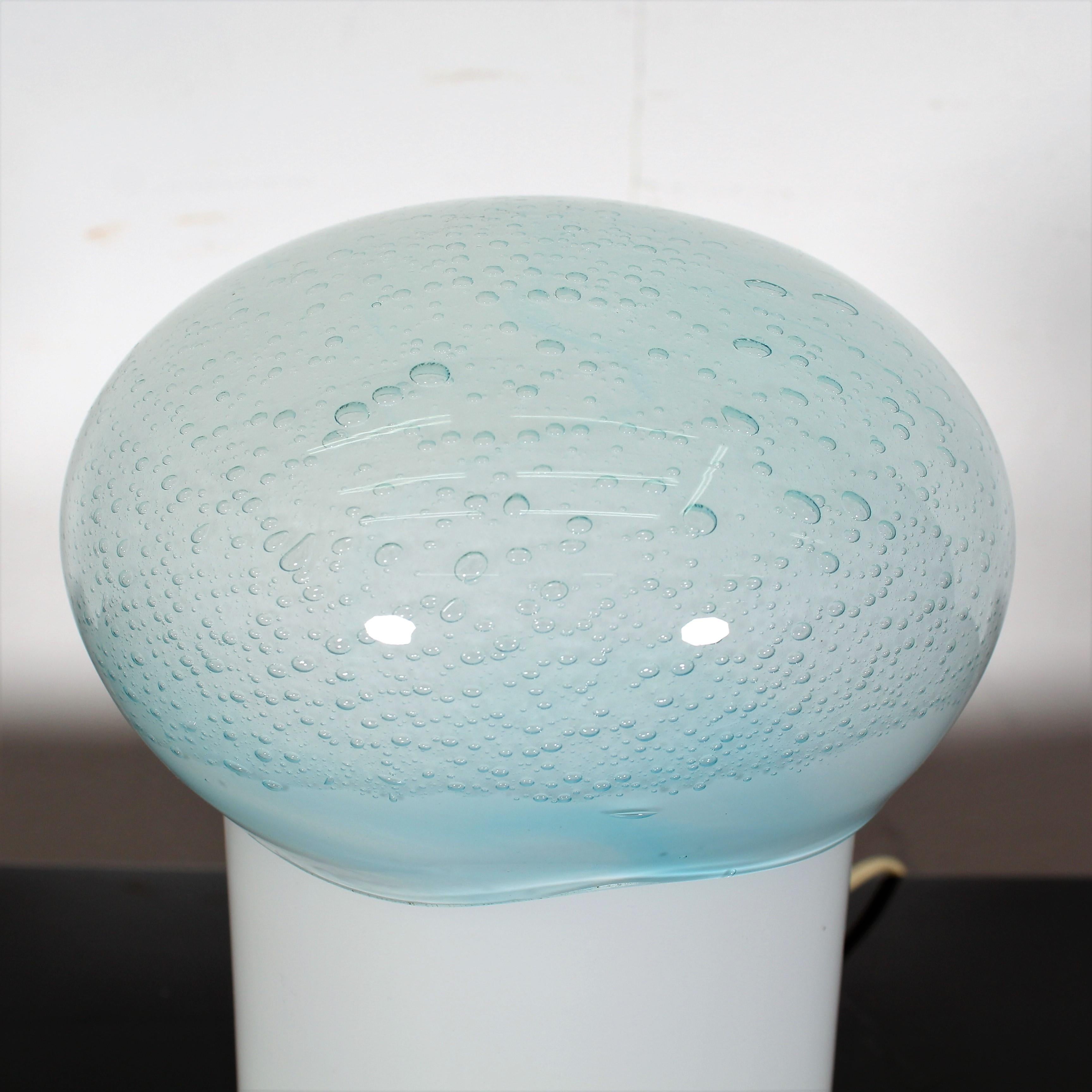 Reflecting the simplicity of vintage design, mushroom table lamp has high-quality glass and a unique character that complements its handmade production. Glass color tone in glossy white and blue. Designed by Carlo Nason for mazzega, circa 1965 in