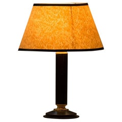 Mid-century modern table lamp in the style of Jacques Adnet